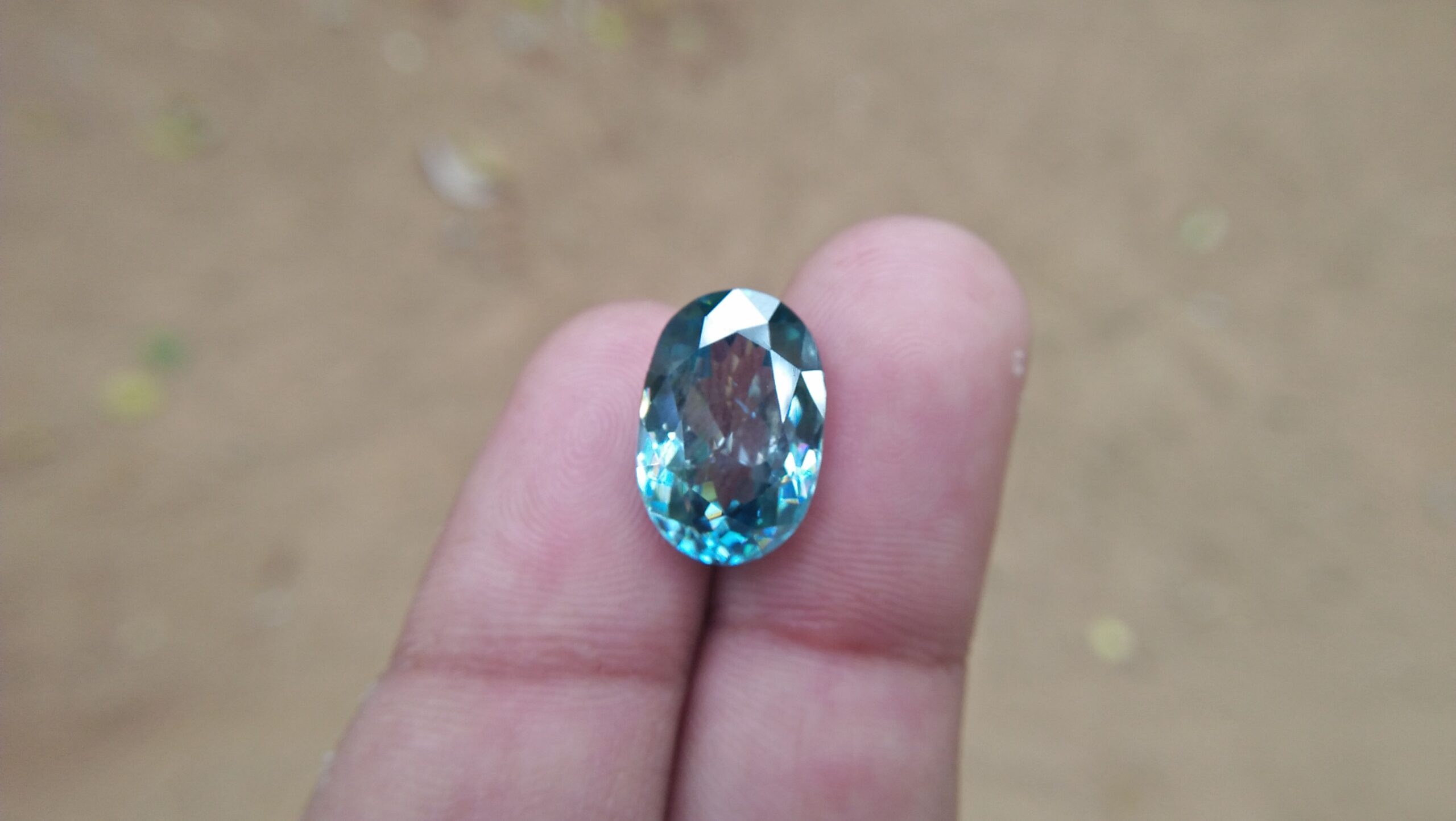 Natural Genuine Blue Zircon - Starlite WEIGHT : 13.03ct COLOUR : Vivid Greenish Blue CUT & SHAPE : Fancy Oval TRANSPARENCY : Transparent MEASUREMMENT : 15.2x 10.35 x 7.21mm SPECREUM : Rare earth spectrum TREATMENT : None "GLK" Certified ( GIA Alumni Association Member/ Member of Gemmological association Great Britain) GLK : UN - 01484 • Blue zircon is one of the US birthstones for December