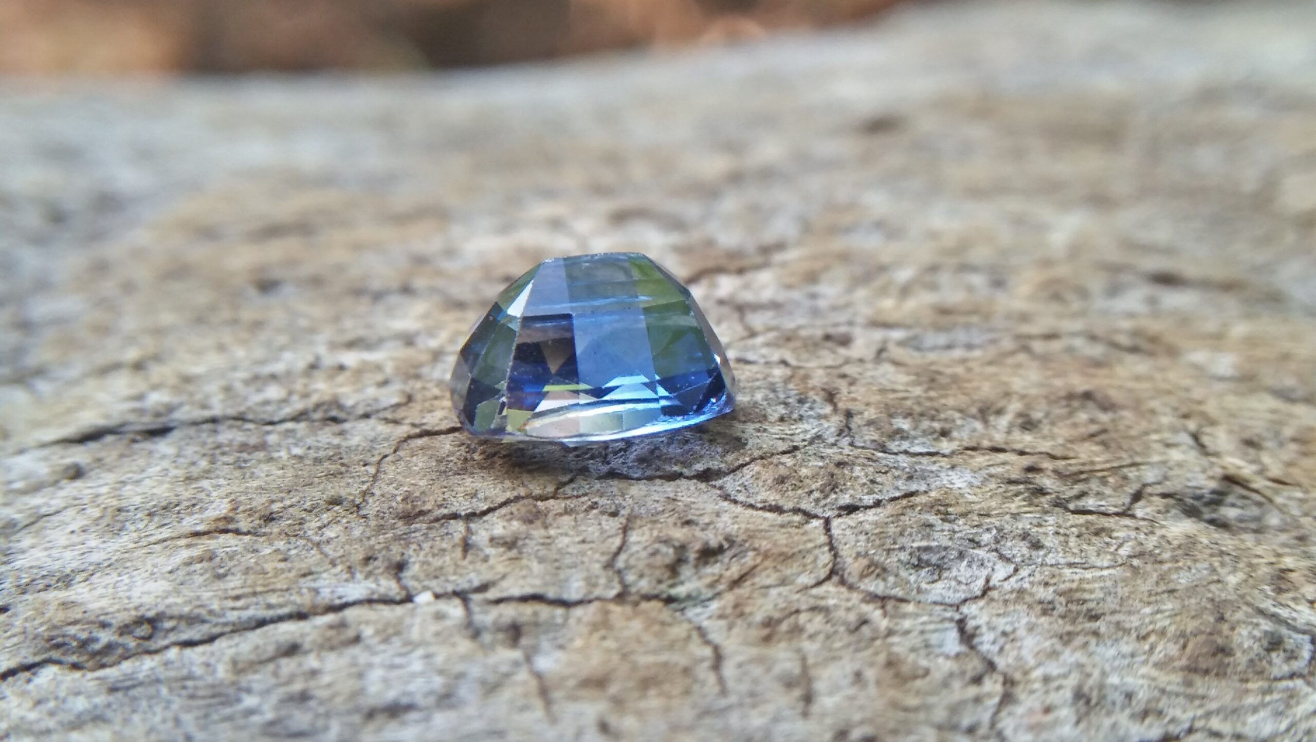 Sapphire is the birthstone for September NATURAL BLUE SAPPHIRE Shape : Cution Cut : Mixed Cut Dimension : 6.8 mmx 5.4 mm x 4.4 mm Weight : 1.50Cts Clarity : VVS Colour : Greenish Blue Transparency : Transparent