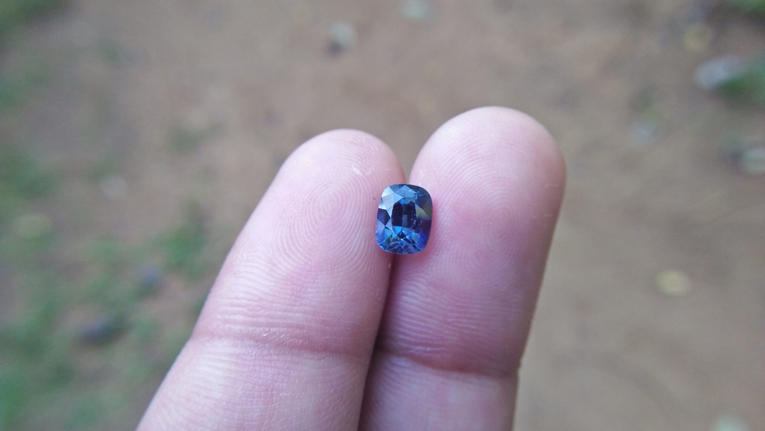 Sapphire is the birthstone for September NATURAL BLUE SAPPHIRE Shape : Cution Cut : Mixed Cut Dimension : 6.8 mmx 5.4 mm x 4.4 mm Weight : 1.50Cts Clarity : VVS Colour : Greenish Blue Transparency : Transparent