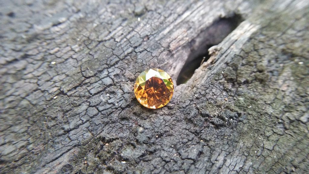 Natural Golden Honey Colour Zircon WEIGHT : 4.20Cts COLOUR : Golden Honey Yellow CUT & SHAPE : Round Flower Cut TRANSPARENCY : Transparent MEASUREMMENT : 8.85 mm x 6 mm TREATMENT : None Origin : Sri Lanka Clarity : SI