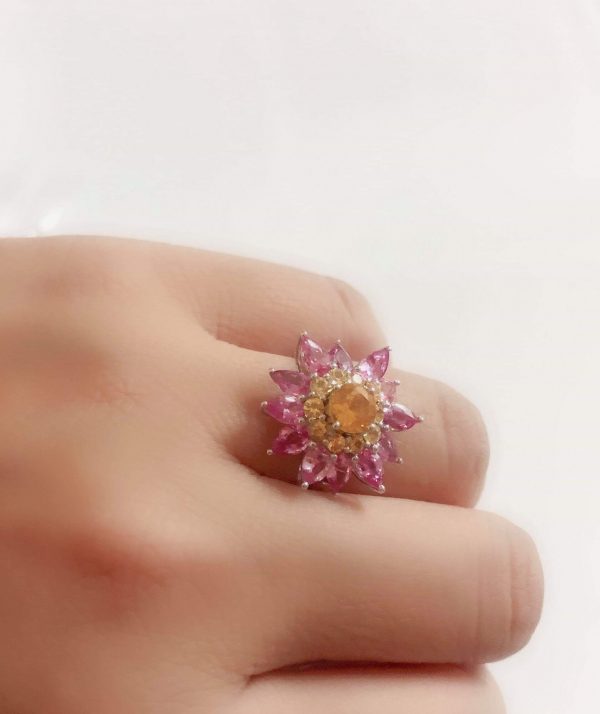 Ceylon Natural Yellow Sapphire & Pink Sapphire Diamond 18K White Gold Flower Ring Main Stone : Ceylon Yellow Sapphire Main Stone Weight : 0.82Cts Other : Small Pink Sapphire & Yellow Sapphire 3.28Cts Metal : 18K White Gold Made from : Japan Weight : 5.2g High Quality Jewellery Made in Japan & Stones from Sri Lanka