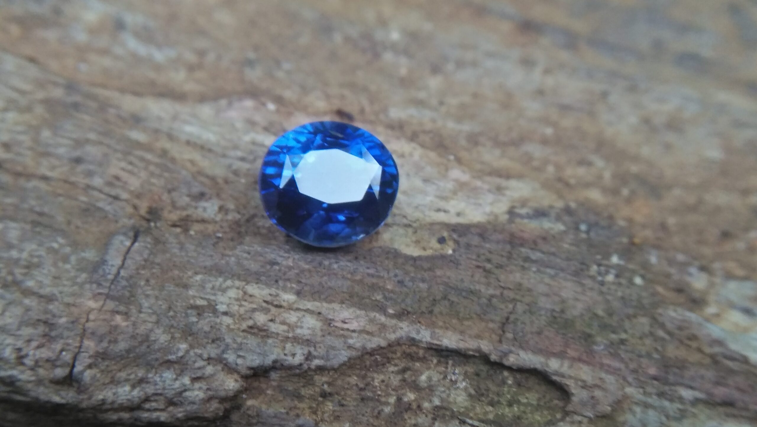 NATURAL BLUE SAPPHIRE Weight : 2.24Cts Dimension : 7.3 mm x 6.6 mm x 5.5 mm Color: Cornflower Blue Treatment: No Heating Transparent: Good Transparency Shape : Oval Clarity : SI Danu Group - Gemstones Directly from the Source Sapphire is a precious gemstone, a variety of the mineral corundum, consisting of aluminum oxide with trace amounts of elements such as iron, titanium, chromium, copper, or magnesium. Sapphire deposits are found in Eastern Australia, Thailand, Sri Lanka, China, Vietnam, Madagascar, Greenland, East Africa, and in North America in mostly in Montana. Madagascar, Sri Lanka, and Kashmir produce large quantities of fine quality Sapphires for the world market. Sapphires are mined from alluvial deposits or from primary underground workings. Blue Sapphire and Ruby are the most popular Gemstone in Corundum Family. also, Orangy Pink Sapphire is called Padparadscha. The name Drive's from the Sinhalese word "padmaraga" " පද්මරාග", meaning lotus blossom, as the stone is of a similar color to the lotus blossom. Bi-Color Sapphire from DanuGroup Collection Also, Sapphire can be found as parti-color, bi-color or fancy color. Australia is a main parti-color Sapphire producer. White Sapphire also, White sapphire is a very popular stone to wear instead of Diamond as a 3rd hardness gemstone after diamond ( moissanite hardness is 9.5). Various colors of star sapphires A star sapphire is a type of sapphire that exhibits a star-like phenomenon known as asterism. Also, A rare variety of natural sapphire, known as color-change sapphire, exhibits different colors in a different light. Sapphires can be treated by several methods to enhance and improve their clarity and color. A common method is done by heating the sapphires in furnaces to temperatures between 500 and 1,850 °C for several hours, or by heating in a nitrogen-deficient atmosphere oven for 1 week or more. Geuda is a form of the mineral corundum. Geuda is found primarily in Sri Lanka. It's a semitransparent and milky appearance due to rutile inclusions. Geuda is used to improve its color by heat treatment. Some geuda varieties turn to a blue color after heat treatments and some turn to red after oxidizing. Also, Kowangu pushparaga turns to yellow sapphire after oxidizing. Sapphire Crystal system is a Trigonal crystal system with a hexagonal scalenohedral crystal class. Sapphire hardness is 9 according to the Mohs hardness scale with 4.0~4.1 specific gravity. Refractive index ω =1.768–1.772 nε =1.760–1.763 Solubility = Insoluble Melting point = 2,030–2,050 °C Birefringence = 0.008 Pleochroism = Strong Luster = Vitreous Sapphire is the birthstone for September and the gem of the 45th anniversary. Healing Properties of Sapphire Sapphire releases mental tension, depression, unwanted thoughts, and spiritual confusion. Sapphire is known as a "stone of Wisdom". It is exceptional for calming and focusing the mind, allowing the release of mental tension and unwanted thoughts. Sapphire is also the best stone for awakening chakras. Dark Blue or Indigo Sapphire stimulates the Third Eye chakra. Blue Sapphire stimulates the Throat Chakra. Green sapphire stimulates Heart Chakra. Black Sapphire stimulates Base Chakra. White sapphire stimulates Crown Chakra. Yellow sapphire stimulates Solar Plexus Chakra. Blue Sapphire stimulates the Throat Chakra, the voice of the body. Blue crystal energy will unblock and balance the Throat Chakra. blue encourages the power of truth, while lighter shades carry the power of flexibility, relaxation, and balance. Blue Sapphire can free one of mental anxiety, helps make one detached, and protects against envy. Also, It can be worn for good luck and for protection against evil spirits. Since Saturn rules the nervous system, blue sapphires help problems of the nerves-tension and neuroses-diseases caused by an afflicted Saturn.