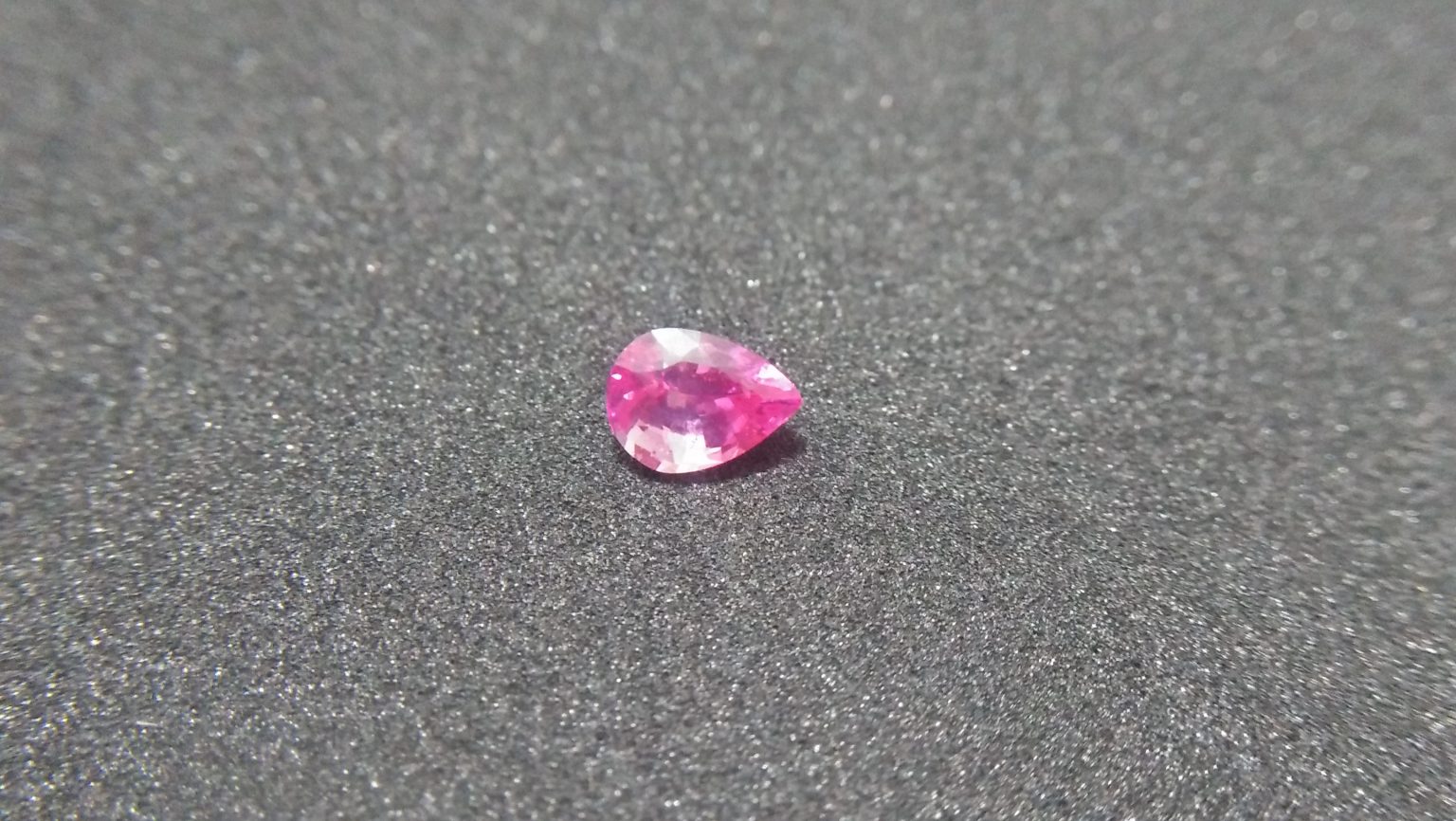CEYLON NATURAL PINK SAPPHIRE Weight : 1.03Cts Dimension : 6.9 mm x 5.0 mm x 3.8 mm Color: Pink Treatment: Unheated Transparent: Good Transparency Shape : Pear Clarity : Vs COLORED STONE LABORATORY CERTIFIED ( GIA Alumni Association Member) CSL Memo No : 492F1E3C8C3B Sapphire is a precious gemstone, a variety of the mineral corundum, consisting of aluminum oxide with trace amounts of elements such as iron, titanium, chromium, copper, or magnesium. Sapphire deposits are found in Eastern Australia, Thailand, Sri Lanka, China, Vietnam, Madagascar, Greenland, East Africa, and in North America in mostly in Montana. Madagascar, Sri Lanka, and Kashmir produce large quantities of fine quality Sapphires for the world market. Sapphires are mined from alluvial deposits or from primary underground workings. Blue Sapphire and Ruby are the most popular Gemstone in Corundum Family. also, Orangy Pink Sapphire is called Padparadscha. The name Drive's from the Sinhalese word "padmaraga" " පද්මරාග", meaning lotus blossom, as the stone is of a similar color to the lotus blossom. Bi-Color Sapphire from DanuGroup Collection Also, Sapphire can be found as parti-color, bi-color or fancy color. Australia is a main parti-color Sapphire producer. White Sapphire also, White sapphire is a very popular stone to wear instead of Diamond as a 3rd hardness gemstone after diamond ( moissanite hardness is 9.5). Various colors of star sapphires A star sapphire is a type of sapphire that exhibits a star-like phenomenon known as asterism. Also, A rare variety of natural sapphire, known as color-change sapphire, exhibits different colors in a different light. Sapphires can be treated by several methods to enhance and improve their clarity and color. A common method is done by heating the sapphires in furnaces to temperatures between 500 and 1,850 °C for several hours, or by heating in a nitrogen-deficient atmosphere oven for 1 week or more. Geuda is a form of the mineral corundum. Geuda is found primarily in Sri Lanka. It's a semitransparent and milky appearance due to rutile inclusions. Geuda is used to improve its color by heat treatment. Some geuda varieties turn to a blue color after heat treatments and some turn to red after oxidizing. Also, Kowangu pushparaga turns to yellow sapphire after oxidizing. Sapphire Crystal system is a Trigonal crystal system with a hexagonal scalenohedral crystal class. Sapphire hardness is 9 according to the Mohs hardness scale with 4.0~4.1 specific gravity. Refractive index ω =1.768–1.772 nε =1.760–1.763 Solubility = Insoluble Melting point = 2,030–2,050 °C Birefringence = 0.008 Pleochroism = Strong Luster = Vitreous Sapphire is the birthstone for September and the gem of the 45th anniversary. Healing Properties of Sapphire Sapphire releases mental tension, depression, unwanted thoughts, and spiritual confusion. Sapphire is known as a "stone of Wisdom". It is exceptional for calming and focusing the mind, allowing the release of mental tension and unwanted thoughts. Sapphire is also the best stone for awakening chakras. Dark Blue or Indigo Sapphire stimulates the Third Eye chakra. Blue Sapphire stimulates the Throat Chakra. Green sapphire stimulates Heart Chakra. Black Sapphire stimulates Base Chakra. White sapphire stimulates Crown Chakra. Yellow sapphire stimulates Solar Plexus Chakra. Pink Sapphire Healings It is believed that pink sapphires used for therapeutic purposes as crystals might nourish the emotional well-being of the person wearing the jewelry crafted from the gems. The theory behind these therapeutic beliefs centers on clearing emotional blockages from the past to release hurtful experiences. • Nourishing the Emotional Body with the PinkColor Ray • Energetic Columns of Support • Longevity and Extending the Lifespan of Your Cells • Astral Vision and Sensitivity to Energy