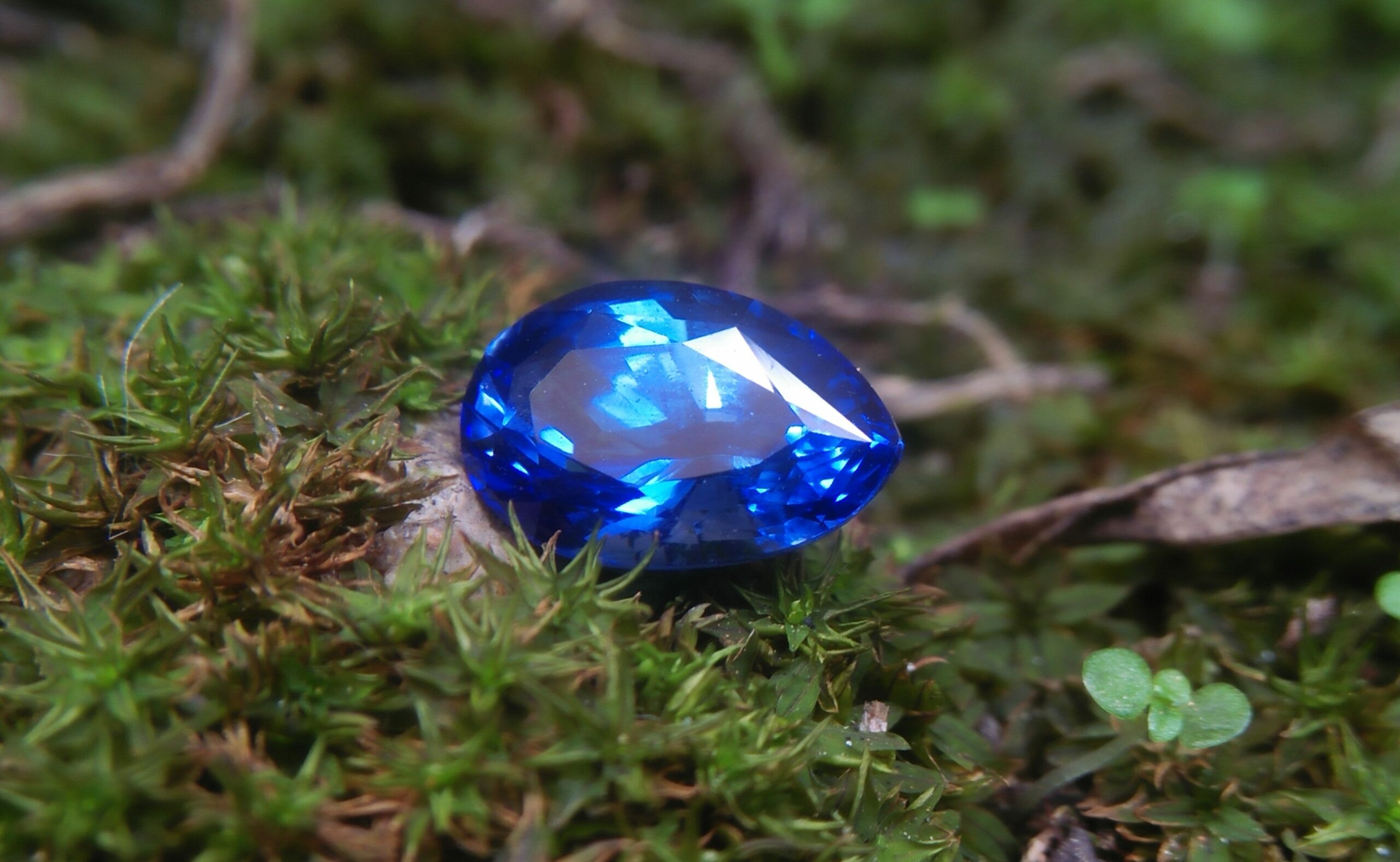 Ceylon Natural Blue Sapphire Colour : Vivid Blue "Royal Blue" Shape : Pear Weight : 1.39Cts Dimension : 8.1mm x 5.3mm x 4.3mm Treatment : Heated Clarity : VS • CSL - Colored Stone Laboratory Certified ( GIA Alumina Association Member ) • CSL Memo No : 4524B473EC71 Sapphire is a precious gemstone, a variety of the mineral corundum, consisting of aluminum oxide with trace amounts of elements such as iron, titanium, chromium, copper, or magnesium. Sapphire deposits are found in Eastern Australia, Thailand, Sri Lanka, China, Vietnam, Madagascar, Greenland, East Africa, and in North America in mostly in Montana. Madagascar, Sri Lanka, and Kashmir produce large quantities of fine quality Sapphires for the world market. Sapphires are mined from alluvial deposits or from primary underground workings. Blue Sapphire and Ruby are the most popular Gemstone in Corundum Family. also, Orangy Pink Sapphire is called Padparadscha. The name Drive's from the Sinhalese word "padmaraga" " පද්මරාග", meaning lotus blossom, as the stone is of a similar color to the lotus blossom. Bi-Color Sapphire from DanuGroup Collection Also, Sapphire can be found as parti-color, bi-color or fancy color. Australia is a main parti-color Sapphire producer. White Sapphire also, White sapphire is a very popular stone to wear instead of Diamond as a 3rd hardness gemstone after diamond ( moissanite hardness is 9.5). Various colors of star sapphires A star sapphire is a type of sapphire that exhibits a star-like phenomenon known as asterism. Also, A rare variety of natural sapphire, known as color-change sapphire, exhibits different colors in a different light. Sapphires can be treated by several methods to enhance and improve their clarity and color. A common method is done by heating the sapphires in furnaces to temperatures between 500 and 1,850 °C for several hours, or by heating in a nitrogen-deficient atmosphere oven for 1 week or more. Geuda is a form of the mineral corundum. Geuda is found primarily in Sri Lanka. It's a semitransparent and milky appearance due to rutile inclusions. Geuda is used to improve its color by heat treatment. Some geuda varieties turn to a blue color after heat treatments and some turn to red after oxidizing. Also, Kowangu pushparaga turns to yellow sapphire after oxidizing. Sapphire Crystal system is a Trigonal crystal system with a hexagonal scalenohedral crystal class. Sapphire hardness is 9 according to the Mohs hardness scale with 4.0~4.1 specific gravity. Refractive index ω =1.768–1.772 nε =1.760–1.763 Solubility = Insoluble Melting point = 2,030–2,050 °C Birefringence = 0.008 Pleochroism = Strong Luster = Vitreous Sapphire is the birthstone for September and the gem of the 45th anniversary. Healing Properties of Sapphire Sapphire releases mental tension, depression, unwanted thoughts, and spiritual confusion. Sapphire is known as a "stone of Wisdom". It is exceptional for calming and focusing the mind, allowing the release of mental tension and unwanted thoughts. Sapphire is also the best stone for awakening chakras. Dark Blue or Indigo Sapphire stimulates the Third Eye chakra. Blue Sapphire stimulates the Throat Chakra. Green sapphire stimulates Heart Chakra. Black Sapphire stimulates Base Chakra. White sapphire stimulates Crown Chakra. Yellow sapphire stimulates Solar Plexus Chakra. Blue Sapphire stimulates the Throat Chakra and Third eye chakra, the voice of the body. Blue crystal energy will unblock and balance the Throat Chakra. blue encourages the power of truth, while lighter shades carry the power of flexibility, relaxation, and balance. Blue Sapphire can free one of mental anxiety, helps make one detached, and protects against envy. Also, It can be worn for good luck and for protection against evil spirits. Since Saturn rules the nervous system, blue sapphires help problems of the nerves-tension and neuroses-diseases caused by an afflicted Saturn.