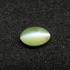 Chrysoberyl Cats Eye Colour : Greenish Yellow Shape : Oval Cut : Cabochon Weight : 1.04 Cts Dimension : 6.5 x 4.1 x 4.1 mm Treatment : Unheated Clarity : Clean • CSL - Colored Stone Laboratory Certified ( GIA Alumina Association Member ) • CSL Memo No : 96FCB5F4103D V The Gemstone Chrysoberyl is an aluminate of beryllium with the chemical formula BeAl₂O₄. The name chrysoberyl is derived from the Greek words "chrysos" and "beryllos". Its meaning is "a gold-white spar". It is known as a hard and durable gem after Sapphire. Chrysoberyl is an orthorhombic crystal mineral with 3.5 – 3.84 specific gravity and 8.5 hardness according to the more hardness scale. It is a Biaxial (+) mineral with refractive indexes nα=1.745 nβ=1.748 nγ=1.754. Chrysoberyl family Gemstones from old collection Chrysoberyl can be found colors such as green, yellow, brownish to greenish-black, colorless, pale shades of yellow, greenish Yellow, Yellowish Green, Honey Brown, Reddish Brown, Orangy yellow, Greenish Brown, Blue. Also, Golden Yellow Chrysoberyl is called "Ceylonese Chrysolite" as a trading name. Alexandrite Alexandrite cats eye The Chrysoberyl Alexandrite is a color change variety upon the nature of ambient lighting. It changes the color green to brownish red or green to purplish-red in the incandescent light from a lamp or candle flame. However, Alexandrite's good color change stones are extremely rare. also, Chrysoberyl alexandrite can be found with a chatoyancy future. It is rare and expensive. Chrysoberyl crystal from Danu Group Old Collection An interesting feature of its crystals are the cyclic twins called trillings. Alexandrite Crystal Under UV Also, Chrysoberyl can be found with the chatoyancy feature. Translucent yellowish chatoyant chrysoberyl is called as cymophane. Also, Chrysoberyl cat's eye is found in colors such as yellowish-green, green, honey brown, grey. The chrysoberyl gemstone or mineral can be found in Sri Lanka, Afghanistan, India, Madagascar, Tanzania, Ethiopia, Australia, Brazil, Canada, France, Germany, Italy, Japan, Kenya, Kazakhstan, Namibia, Myanmar, Mozambique, Norway, Russia, Spain, USA, Zambia. Healing Properties of Chrysoberyls Chrysoberyl is known as an effective and protective stone since ancient times. It transforms negative thoughts into positive energy. Chrysoberyl gemstone or mineral is associated with wealth and creativity and promotes tolerance and harmony. It stimulates the solar plexus and crown chakras. Chrysoberyl helps to open the crown chakra and increases both spiritual and personal power. Green chrysoberyl stimulates the healing of the physical heart. Chrysoberyl stimulates the cleansing and balancing of the liver, kidneys, gall bladder and balances adrenaline and cholesterol and fortifies the chest and liver. Chrysoberyl Cat's eye increases the vibration of Ketu in the wearer according to Vedic Astrology. It is known to reduce the malefic effects of 'Ketu' and increase its beneficial qualities. Chrysoberyl transforms negative thoughts into positive energy. It supports self-healing. Chrysoberyl balances adrenaline and cholesterol and fortifies the chest and liver.
