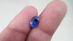 NATURAL BLUE SAPPHIRE (Royal Blue) Colour : Vivid Blue "Royal Blue" Shape : Oval Weight : 2.54 CTS Dimension : 9.6 x 7.4 x 4.3 mm Treatment : Heated Clarity : SI • CSL - Colored Stone Laboratory Certified ( GIA Alumina Association Member ) • CSL Memo No : 386B09FEEC7E Sapphire is a precious gemstone, a variety of the mineral corundum, consisting of aluminum oxide with trace amounts of elements such as iron, titanium, chromium, copper, or magnesium. Sapphire deposits are found in Eastern Australia, Thailand, Sri Lanka, China, Vietnam, Madagascar, Greenland, East Africa, and in North America in mostly in Montana. Madagascar, Sri Lanka, and Kashmir produce large quantities of fine quality Sapphires for the world market. Sapphires are mined from alluvial deposits or from primary underground workings. Blue Sapphire and Ruby are the most popular Gemstone in Corundum Family. also, Orangy Pink Sapphire is called Padparadscha. The name Drive's from the Sinhalese word "padmaraga" " පද්මරාග", meaning lotus blossom, as the stone is of a similar color to the lotus blossom. Bi-Color Sapphire from DanuGroup Collection Also, Sapphire can be found as parti-color, bi-color or fancy color. Australia is a main parti-color Sapphire producer. White Sapphire also, White sapphire is a very popular stone to wear instead of Diamond as a 3rd hardness gemstone after diamond ( moissanite hardness is 9.5). Various colors of star sapphires A star sapphire is a type of sapphire that exhibits a star-like phenomenon known as asterism. Also, A rare variety of natural sapphire, known as color-change sapphire, exhibits different colors in a different light. Sapphires can be treated by several methods to enhance and improve their clarity and color. A common method is done by heating the sapphires in furnaces to temperatures between 500 and 1,850 °C for several hours, or by heating in a nitrogen-deficient atmosphere oven for 1 week or more. Geuda is a form of the mineral corundum. Geuda is found primarily in Sri Lanka. It's a semitransparent and milky appearance due to rutile inclusions. Geuda is used to improve its color by heat treatment. Some geuda varieties turn to a blue color after heat treatments and some turn to red after oxidizing. Also, Kowangu pushparaga turns to yellow sapphire after oxidizing. Sapphire Crystal system is a Trigonal crystal system with a hexagonal scalenohedral crystal class. Sapphire hardness is 9 according to the Mohs hardness scale with 4.0~4.1 specific gravity. Refractive index ω          =1.768–1.772 nε =1.760–1.763 Solubility = Insoluble Melting point = 2,030–2,050 °C Birefringence  = 0.008 Pleochroism = Strong Luster = Vitreous Sapphire is the birthstone for September and the gem of the 45th anniversary. Healing Properties of Sapphire Sapphire releases mental tension, depression, unwanted thoughts, and spiritual confusion.  Sapphire is known as a "stone of Wisdom". It is exceptional for calming and focusing the mind, allowing the release of mental tension and unwanted thoughts. Sapphire is also the best stone for awakening chakras. Dark Blue or Indigo Sapphire stimulates the Third Eye chakra. Blue Sapphire stimulates the Throat Chakra. Green sapphire stimulates Heart Chakra. Black Sapphire stimulates Base Chakra. White sapphire stimulates Crown Chakra. Yellow sapphire stimulates Solar Plexus Chakra. Blue Sapphire stimulates the Throat Chakra and Third eye chakra, the voice of the body. Blue crystal energy will unblock and balance the Throat Chakra. blue encourages the power of truth, while lighter shades carry the power of flexibility, relaxation, and balance. Blue Sapphire can free one of mental anxiety, helps make one detached, and protects against envy. Also, It can be worn for good luck and for protection against evil spirits. Since Saturn rules the nervous system, blue sapphires help problems of the nerves-tension and neuroses-diseases caused by an afflicted Saturn.