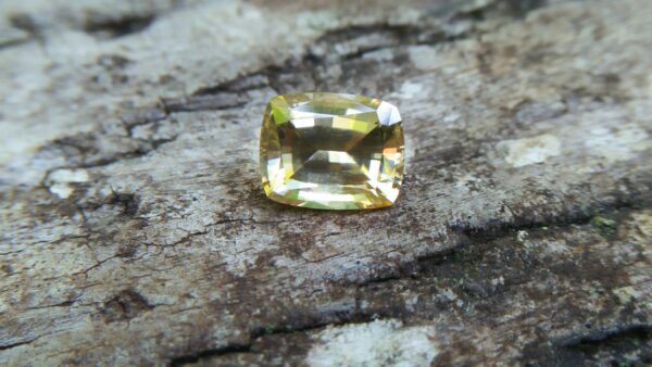 Colour : Yellow Shape : Cushion Weight : 3.23CTS Dimension : 8.5 x 6.8 x 5.1 mm Treatment : UNHeated Clarity : Clean • CSL - Colored Stone Laboratory Certified ( GIA Alumni Association Member ) • CSL Memo No : 07062E8FF92C