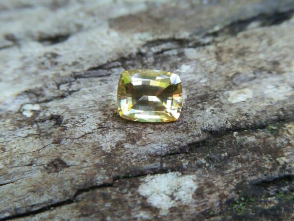 Colour : Yellow Shape : Cushion Weight : 3.23CTS Dimension : 8.5 x 6.8 x 5.1 mm Treatment : UNHeated Clarity : Clean • CSL - Colored Stone Laboratory Certified ( GIA Alumina Association Member ) • CSL Memo No : 07062E8FF92C