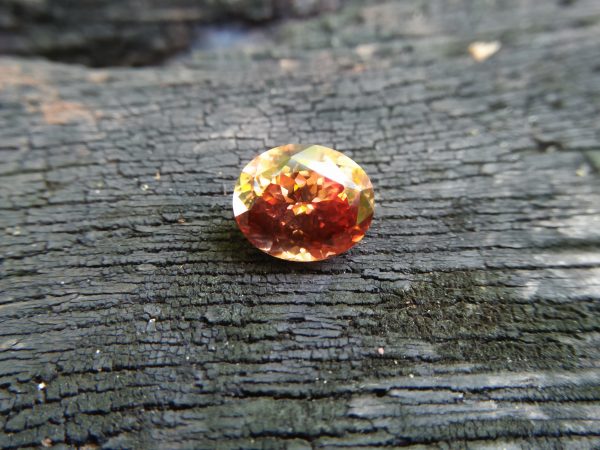 Ceylon Natural Jacinth Zircon Colour : Orangy Brown Shape : Oval Weight : 8.48 CTS Dimension : 12.1 x 10.2 x 7.2 mm Treatment : None/Unheated Clarity : Clean • CSL - Colored Stone Laboratory Certified ( GIA Alumina Association Member ) • CSL Memo No : ABD49DE09EA9