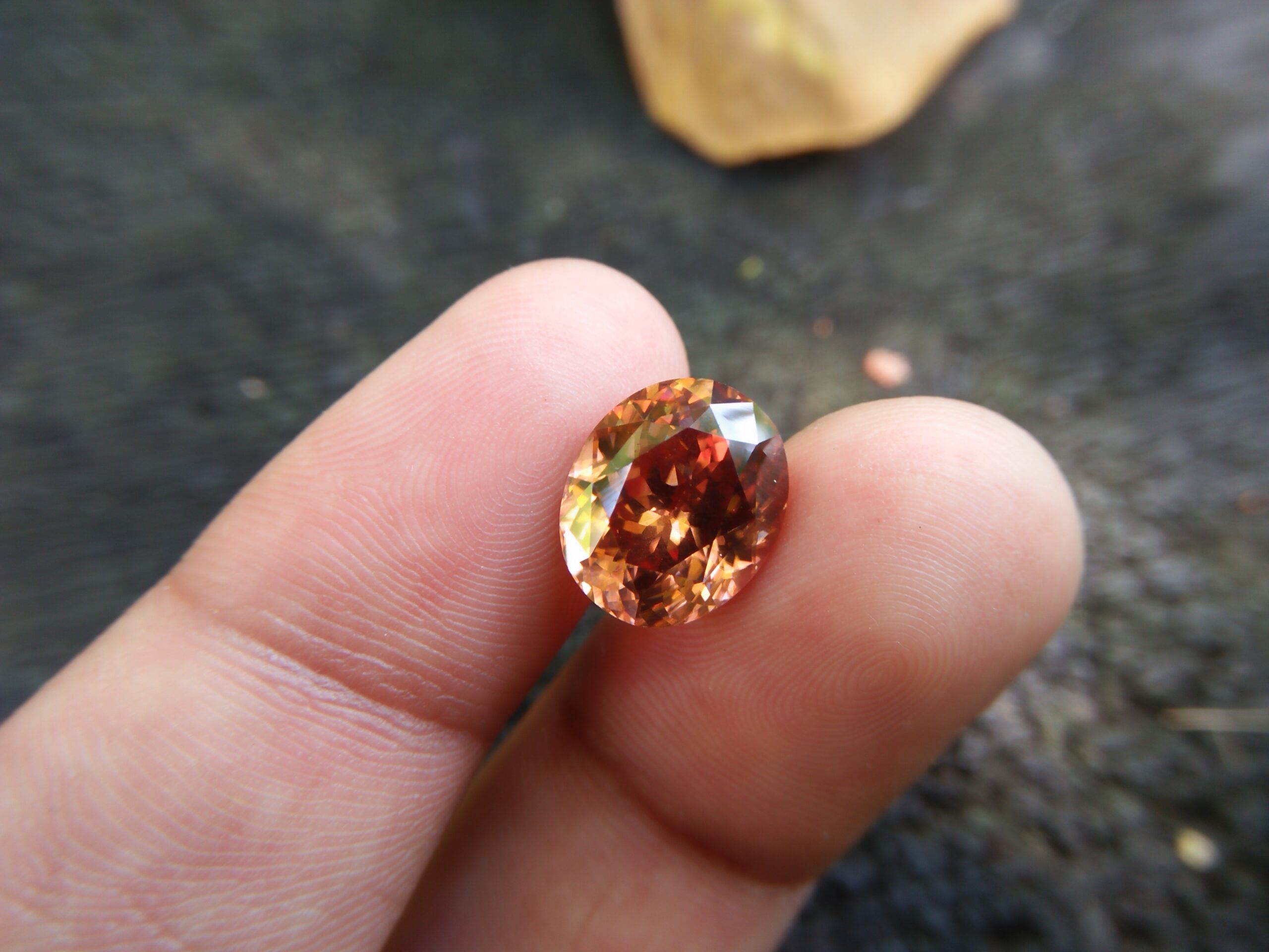 Ceylon Natural Jacinth Zircon Colour : Orangy Brown Shape : Oval Weight : 8.48 CTS Dimension : 12.1 x 10.2 x 7.2 mm Treatment : None/Unheated Clarity : Clean • CSL - Colored Stone Laboratory Certified ( GIA Alumina Association Member ) • CSL Memo No : ABD49DE09EA9 Natural  Zircon Zircon is nesosilicates group mineral. Its corresponding chemical formula is ZrSiO4. The name derives from the Persian zargun, meaning "gold-hued". Zircon is a popular gemstone that has been used for nearly 2000 years. The crystal structure of zircon is a tetragonal crystal system with 7.5 hardness according to the Mohs Hardness scale. Zircon is also very resistant to heat and corrosion and known as Insoluble gemstone. This Uniaxial (+) mineral Specific gravity is 4.6–4.7. It's heavy more than such as Sapphire, chrysoberyl, Garnets, spinels. Gem Businessmen use this physical properties to identify zircons from other gemstones. Zircon has weak pleochroism and has colors such as Colorless, Very Strong Blue To Green-Blue, Yellow, Blue-Green, Yellowish Green, Yellow-Green, Brown, Orangy Yellow To Reddish Orange, Dark Brownish Red, Sometimes Purple, Gray To Bluish Gray, Brownish Gray. Colorless specimens that show gem quality are a popular substitute for diamond and are also known as "Matara diamond". Zircon has been classified into three types called high zircon, intermediate zircon ( medium zircon ), and low zircon. Some Quality Type brown zircons can be transformed into colorless and blue zircons by heating to 800 to 1000 °C. There are Some using names for Zircon such as Hyacinth or jacinth: yellow-red, orange, red-brown to brown, Jargoon or jargon: light yellow to colorless stones, Beccarite: green zircon, Melichrysos: straw yellow, Starlite: blue heat treated zircon, Sparklite: colorless zircon. Zircon is found in Madagascar, Sri Lanka, Tanzania, Cambodia, Australia, Burma, Afghanistan, Canada, USA, Thailand, Russia, Mozambique, Norway. Healing Properties 👇 Zircon is known as "The stone of virtue" All colors. It clears the auric negativity in the wearer and helps to communicate with the higher realm when in need. Zircon is very well known for its balancing and positive energy effects. It can attract happiness, prosperity and abundance to the wearer. It will bring the spiritual energy down from the higher transpersonal chakras via the crown chakra, then move it to all of the lower chakras.