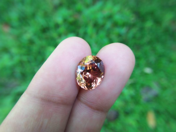 Ceylon Natural Jacinth Zircon Colour : Orangy Brown Shape : Oval Weight : 8.48 CTS Dimension : 12.1 x 10.2 x 7.2 mm Treatment : None/Unheated Clarity : Clean • CSL - Colored Stone Laboratory Certified ( GIA Alumina Association Member ) • CSL Memo No : ABD49DE09EA9