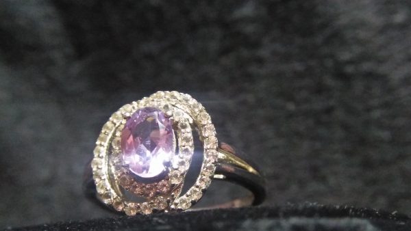 Natural Lavender Amethyst 925 Silver Ring Amethyst is a violet variety of quartz. Amethyst is a semiprecious stone often used in jewelry and is the traditional birthstone for February. Amethyst has healing powers to help with physical ailments, emotional issues, and in Energy Healing and Chakra balancing. Amethyst crystal therapies are primarily associated with physical ailments of the nervous system, the curing of nightmares and insomnia, and balancing the crown chakra. Silver is a chemical element with symbol Ag and atomic number 47. Also Silver is the metal of emotions, of the psychic mind, and of loving as well as healing. It is used to bring patience and perseverance to the wearer