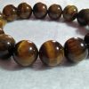 Tiger Eye Bracelet  Stone : Natural Tiger Eye Shape : Round Size : 8.8mm / 10.3mm / 12mm Treatment : Unheated / Natural Design : Gent / Ladies Both