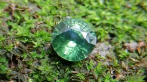 Ceylon Natural Beccarite 绿色锆石 Beccarite is green colour Veriety of Zircon Family. Zircon is a mineral belonging to the group of nesosilicates. Its chemical name is zirconium silicate, and its corresponding chemical formula is ZrSiO₄. Green Zircon is rare Colour Type of Zircon family. Zircon is ubiquitous in the crust of Earth. It occurs as a common accessory mineral in igneous rocks in metamorphic rocks and as detrital grains in sedimentary rocks. Zircon is also very resistant to heat and corrosion. Because of their uranium and thorium content, some zircons undergo metamictization. Connected to internal radiation damage, these processes partially disrupt the crystal structure and partly explain the highly variable properties of zircon. As zircon becomes more and more modified by internal radiation damage, the density decreases, the crystal structure is compromised, and the color changes