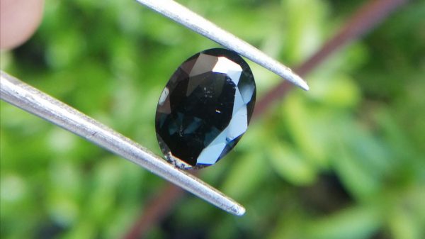 Colour : Dark Blue Shape : Oval Weight : 2.67 cts Dimension : 9.9 x 7.2 x 5.0 mm Treatment : Unheated Clarity : SI • CSL - Colored Stone Laboratory Certified ( GIA Alumni Association Member ) • CSL Memo No : C5EF979DF73F Spinel is the magnesium-aluminum member of the larger spinel group of minerals with chemical formula MgAl₂O₄. Spinel is actually a large group of minerals. Gahnite, hercynite, ceylonite, picotite, and galaxite are all part of the spinel group. This oxide mineral is a Cubic crystal system with 7.5–8.0 hardness according to the Mohs hardness scale. Spinels Specific Gravity is depending on the composition of chemicals such as Zn-rich spinel can be as high as 4.40, otherwise, it averages from 3.58 to 3.61. Spinel has many colors such as red, pink, blue, lavender/violet, dark green, brown, black, colorless, gray. Spinel is a single reflective Non-pleochroic gemstone and Anomalous in some blue zincian varieties. It can be found as Opaque, Translucent or transparent. Spinel RI value is n = 1.719 Some red and pink spinels have fluorescence under UV Light. also, Some spinels have magnetism Weak to medium. Natural spinels typically are not enhanced. Spinels are found in Madagascar, Sri Lanka, Vietnam, Myanmar, Tanzania, Kenya, Nigeria, Afghanistan, Albania, Algeria, Atlantic Ocean, Australia, Belgium, Bolivia, Brazil, Cambodia, Canada. Spinel has long been found in the gemstone-bearing gravel of Sri Lanka. Since 2000 in several locations around the world have been discovered spinels with unusual vivid colors. when the mineral is pure, it’s colorless. That's called allochromatic gemstones. Als, Spinels are found with 4-rayed stars and 6-rayed stars. Some spinels are found with a color-changing effect such as Blue to violet, Grayish-blue to reddish-violet and some stones from Sri Lanka change from violet to reddish violet, due to the presence of Fe, Cr, and V. Blue Spinel is a very special gemstone because it is one of the few that occur naturally. The blue Spinel is colored from the impurity of Cobalt in the crystal lattice. High Color saturation in blue Spinels are always colored by Cobalt and are extremely rare to find. Cobalt spinel has high market value. Healing Properties of Spinels 👇 Spinel is known as the stone of revitalization. This MgAl2O4 mineral powers make the gums and teeth stronger and is also beneficial for gums, skin, slimming the healthy and overweight body and cancer healing. Spinel promotes physical vitality, refills the energy and eases exhaustion. Spinel is a very soothing stone, as it calms and relieves stress, anxiety, PTSD and depression. Also, Spinel is working with chakra balancing. Black Spinel - Earth Star Chakra , Red or Pink - Spinel Base Chakra, Green Spinel - Heart chakra, Blue Spinel - Throat chakra, Purple Spinel - Crown chakra.