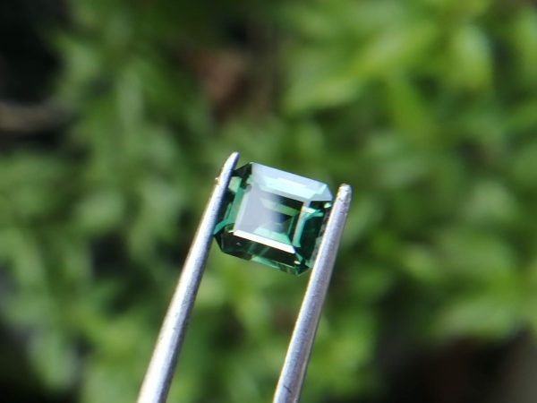 Natural Green Sapphire  Colour : Green Shape : Octagon Weight : 1.52 CTS Dimension : 6.8 x 6.0 x 3.7 mm Treatment : Unheated Clarity : VS • CSL - Colored Stone Laboratory Certified ( GIA Alumni Association Member ) • CSL Memo No : C25A834CB509 Sapphire is a precious gemstone, a variety of the mineral corundum, consisting of aluminum oxide with trace amounts of elements such as iron, titanium, chromium, copper, or magnesium. Sapphire deposits are found in Eastern Australia, Thailand, Sri Lanka, China, Vietnam, Madagascar, Greenland, East Africa, and in North America in mostly in Montana. Madagascar, Sri Lanka, and Kashmir produce large quantities of fine quality Sapphires for the world market. Sapphires are mined from alluvial deposits or from primary underground workings. Blue Sapphire and Ruby are the most popular Gemstone in Corundum Family. also, Orangy Pink Sapphire is called Padparadscha. The name Drive's from the Sinhalese word "padmaraga" " පද්මරාග", meaning lotus blossom, as the stone is of a similar color to the lotus blossom. Bi-Color Sapphire from DanuGroup Collection Also, Sapphire can be found as parti-color, bi-color or fancy color. Australia is a main parti-color Sapphire producer. White Sapphire also, White sapphire is a very popular stone to wear instead of Diamond as a 3rd hardness gemstone after diamond ( moissanite hardness is 9.5). Various colors of star sapphires A star sapphire is a type of sapphire that exhibits a star-like phenomenon known as asterism. Also, A rare variety of natural sapphire, known as color-change sapphire, exhibits different colors in a different light. Sapphires can be treated by several methods to enhance and improve their clarity and color. A common method is done by heating the sapphires in furnaces to temperatures between 500 and 1,850 °C for several hours, or by heating in a nitrogen-deficient atmosphere oven for 1 week or more. Geuda is a form of the mineral corundum. Geuda is found primarily in Sri Lanka. It's a semitransparent and milky appearance due to rutile inclusions. Geuda is used to improve its color by heat treatment. Some geuda varieties turn to a blue color after heat treatments and some turn to red after oxidizing. Also, Kowangu pushparaga turns to yellow sapphire after oxidizing. Sapphire Crystal system is a Trigonal crystal system with a hexagonal scalenohedral crystal class. Sapphire hardness is 9 according to the Mohs hardness scale with 4.0~4.1 specific gravity. Refractive index ω          =1.768–1.772 nε =1.760–1.763 Solubility = Insoluble Melting point = 2,030–2,050 °C Birefringence  = 0.008 Pleochroism = Strong Luster = Vitreous Sapphire is the birthstone for September and the gem of the 45th anniversary. Healing Properties of Sapphire Sapphire releases mental tension, depression, unwanted thoughts, and spiritual confusion.  Sapphire is known as a "stone of Wisdom". It is exceptional for calming and focusing the mind, allowing the release of mental tension and unwanted thoughts. Sapphire is also the best stone for awakening chakras. Dark Blue or Indigo Sapphire stimulates the Third Eye chakra. Blue Sapphire stimulates the Throat Chakra. Green sapphire stimulates Heart Chakra. Black Sapphire stimulates Base Chakra. White sapphire stimulates Crown Chakra. Yellow sapphire stimulates Solar Plexus Chakra. In Vedic astrology, Green Sapphire represents planet Mercury and is worn to bring calmness and positivity, improve concentration, self-confidence, and overall mental health. It is also recommended as an effective healing stone for varied healing therapies. Green Sapphire opens the heart to compassion. It helps in understanding others’ needs and encourages respect for differences. It stimulates the Heart Chakra located near the center of the breastbone.