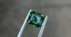 Natural Green Sapphire  Colour : Green Shape : Octagon Weight : 1.52 CTS Dimension : 6.8 x 6.0 x 3.7 mm Treatment : Unheated Clarity : VS • CSL - Colored Stone Laboratory Certified ( GIA Alumina Association Member ) • CSL Memo No : C25A834CB509 Sapphire is a precious gemstone, a variety of the mineral corundum, consisting of aluminum oxide with trace amounts of elements such as iron, titanium, chromium, copper, or magnesium. Sapphire deposits are found in Eastern Australia, Thailand, Sri Lanka, China, Vietnam, Madagascar, Greenland, East Africa, and in North America in mostly in Montana. Madagascar, Sri Lanka, and Kashmir produce large quantities of fine quality Sapphires for the world market. Sapphires are mined from alluvial deposits or from primary underground workings. Blue Sapphire and Ruby are the most popular Gemstone in Corundum Family. also, Orangy Pink Sapphire is called Padparadscha. The name Drive's from the Sinhalese word "padmaraga" " පද්මරාග", meaning lotus blossom, as the stone is of a similar color to the lotus blossom. Bi-Color Sapphire from DanuGroup Collection Also, Sapphire can be found as parti-color, bi-color or fancy color. Australia is a main parti-color Sapphire producer. White Sapphire also, White sapphire is a very popular stone to wear instead of Diamond as a 3rd hardness gemstone after diamond ( moissanite hardness is 9.5). Various colors of star sapphires A star sapphire is a type of sapphire that exhibits a star-like phenomenon known as asterism. Also, A rare variety of natural sapphire, known as color-change sapphire, exhibits different colors in a different light. Sapphires can be treated by several methods to enhance and improve their clarity and color. A common method is done by heating the sapphires in furnaces to temperatures between 500 and 1,850 °C for several hours, or by heating in a nitrogen-deficient atmosphere oven for 1 week or more. Geuda is a form of the mineral corundum. Geuda is found primarily in Sri Lanka. It's a semitransparent and milky appearance due to rutile inclusions. Geuda is used to improve its color by heat treatment. Some geuda varieties turn to a blue color after heat treatments and some turn to red after oxidizing. Also, Kowangu pushparaga turns to yellow sapphire after oxidizing. Sapphire Crystal system is a Trigonal crystal system with a hexagonal scalenohedral crystal class. Sapphire hardness is 9 according to the Mohs hardness scale with 4.0~4.1 specific gravity. Refractive index ω          =1.768–1.772 nε =1.760–1.763 Solubility = Insoluble Melting point = 2,030–2,050 °C Birefringence  = 0.008 Pleochroism = Strong Luster = Vitreous Sapphire is the birthstone for September and the gem of the 45th anniversary. Healing Properties of Sapphire Sapphire releases mental tension, depression, unwanted thoughts, and spiritual confusion.  Sapphire is known as a "stone of Wisdom". It is exceptional for calming and focusing the mind, allowing the release of mental tension and unwanted thoughts. Sapphire is also the best stone for awakening chakras. Dark Blue or Indigo Sapphire stimulates the Third Eye chakra. Blue Sapphire stimulates the Throat Chakra. Green sapphire stimulates Heart Chakra. Black Sapphire stimulates Base Chakra. White sapphire stimulates Crown Chakra. Yellow sapphire stimulates Solar Plexus Chakra. In Vedic astrology, Green Sapphire represents planet Mercury and is worn to bring calmness and positivity, improve concentration, self-confidence, and overall mental health. It is also recommended as an effective healing stone for varied healing therapies. Green Sapphire opens the heart to compassion. It helps in understanding others’ needs and encourages respect for differences. It stimulates the Heart Chakra located near the center of the breastbone.