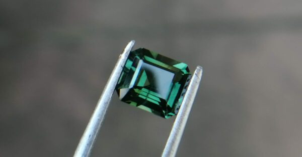 Natural Green Sapphire  Colour : Green Shape : Octagon Weight : 1.52 CTS Dimension : 6.8 x 6.0 x 3.7 mm Treatment : Unheated Clarity : VS • CSL - Colored Stone Laboratory Certified ( GIA Alumina Association Member ) • CSL Memo No : C25A834CB509 Sapphire is a precious gemstone, a variety of the mineral corundum, consisting of aluminum oxide with trace amounts of elements such as iron, titanium, chromium, copper, or magnesium. Sapphire deposits are found in Eastern Australia, Thailand, Sri Lanka, China, Vietnam, Madagascar, Greenland, East Africa, and in North America in mostly in Montana. Madagascar, Sri Lanka, and Kashmir produce large quantities of fine quality Sapphires for the world market. Sapphires are mined from alluvial deposits or from primary underground workings. Blue Sapphire and Ruby are the most popular Gemstone in Corundum Family. also, Orangy Pink Sapphire is called Padparadscha. The name Drive's from the Sinhalese word "padmaraga" " පද්මරාග", meaning lotus blossom, as the stone is of a similar color to the lotus blossom. Bi-Color Sapphire from DanuGroup Collection Also, Sapphire can be found as parti-color, bi-color or fancy color. Australia is a main parti-color Sapphire producer. White Sapphire also, White sapphire is a very popular stone to wear instead of Diamond as a 3rd hardness gemstone after diamond ( moissanite hardness is 9.5). Various colors of star sapphires A star sapphire is a type of sapphire that exhibits a star-like phenomenon known as asterism. Also, A rare variety of natural sapphire, known as color-change sapphire, exhibits different colors in a different light. Sapphires can be treated by several methods to enhance and improve their clarity and color. A common method is done by heating the sapphires in furnaces to temperatures between 500 and 1,850 °C for several hours, or by heating in a nitrogen-deficient atmosphere oven for 1 week or more. Geuda is a form of the mineral corundum. Geuda is found primarily in Sri Lanka. It's a semitransparent and milky appearance due to rutile inclusions. Geuda is used to improve its color by heat treatment. Some geuda varieties turn to a blue color after heat treatments and some turn to red after oxidizing. Also, Kowangu pushparaga turns to yellow sapphire after oxidizing. Sapphire Crystal system is a Trigonal crystal system with a hexagonal scalenohedral crystal class. Sapphire hardness is 9 according to the Mohs hardness scale with 4.0~4.1 specific gravity. Refractive index ω          =1.768–1.772 nε =1.760–1.763 Solubility = Insoluble Melting point = 2,030–2,050 °C Birefringence  = 0.008 Pleochroism = Strong Luster = Vitreous Sapphire is the birthstone for September and the gem of the 45th anniversary. Healing Properties of Sapphire Sapphire releases mental tension, depression, unwanted thoughts, and spiritual confusion.  Sapphire is known as a "stone of Wisdom". It is exceptional for calming and focusing the mind, allowing the release of mental tension and unwanted thoughts. Sapphire is also the best stone for awakening chakras. Dark Blue or Indigo Sapphire stimulates the Third Eye chakra. Blue Sapphire stimulates the Throat Chakra. Green sapphire stimulates Heart Chakra. Black Sapphire stimulates Base Chakra. White sapphire stimulates Crown Chakra. Yellow sapphire stimulates Solar Plexus Chakra. In Vedic astrology, Green Sapphire represents planet Mercury and is worn to bring calmness and positivity, improve concentration, self-confidence, and overall mental health. It is also recommended as an effective healing stone for varied healing therapies. Green Sapphire opens the heart to compassion. It helps in understanding others’ needs and encourages respect for differences. It stimulates the Heart Chakra located near the center of the breastbone.