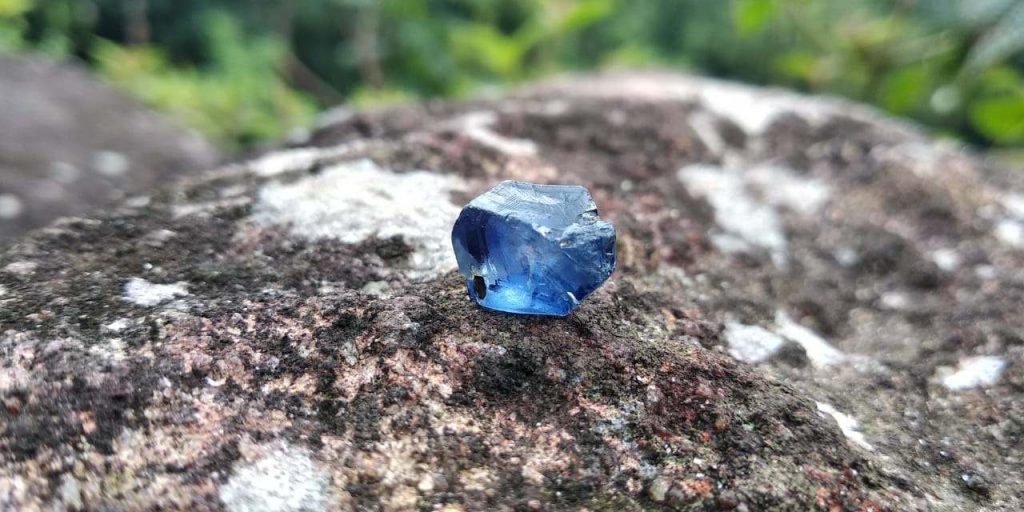 Blue Sapphire is a color variety of mineral corundum. The intense blue of the sapphire is caused by the addition of titanium and iron to the mineral corundum. Blue Sapphire color can be described in terms of hue, saturation, and tone. It is evaluated based upon the purity of their blue hue. 