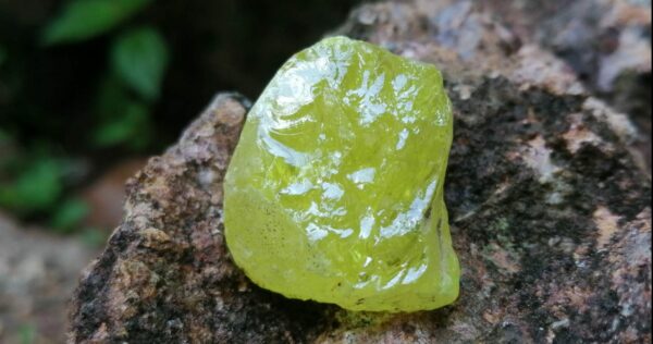 Sulfur is a chemical element with an atomic number of 16 and an atomic symbol of S. At room temperature it is a yellow crystalline solid. Even though it is insoluble in water, it is one of the most versatile elements at forming compounds. Jupiter's moon has over 400 active volcanoes that emit enormous amounts of sulfur - so much sulfur that the moon has a yellowish color. Sulfur reacts and forms compounds with all elements except gold, iodine, iridium, nitrogen, platinum, tellurium, and the inert gases. Sulfer has many colours like Yellow, Brownish yellow to greenish yellow. Red when molten at over 200 degrees Celsius. Burns with a flame that can be difficult to see in daylight but is blue in the dark. Sulfer Crystals are resinous to greasy. Sulfer About 90% is used to manufacture sulfuric acid. The remainder is used in a variety of products that include hydrogen sulfide, insecticides, herbicides, fungicides, pharmaceuticals, soaps, textiles, papers, processed rubber, gunpowder, leather, paint, dyes, food preservatives. - Mohs Hardness = 1.5 to 2.5 - Specific Gravity = 2.0 to 2.1 - Diaphaneity = Transparent to translucent - Crystal System = Orthorhombic - Chemical Classification = Native element Elemental sulfur can be found near hot springs and volcanic regions in many parts of the world, especially along the Pacific Ring of Fire; such volcanic deposits are currently mined in Indonesia, Chile, and Japan. 