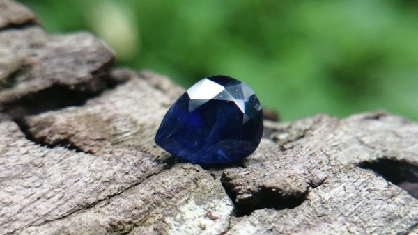 Colour : Vivid Blue "Royal Blue" Shape : Pear Weight : 1.00 ct Dimension : 6.1 x 5.1 x 3.9 mm Treatment : Heated Clarity : I Sapphire is a precious gemstone, a variety of the mineral corundum, consisting of aluminum oxide with trace amounts of elements such as iron, titanium, chromium, copper, or magnesium. Sapphire deposits are found in Eastern Australia, Thailand, Sri Lanka, China, Vietnam, Madagascar, Greenland, East Africa, and in North America in mostly in Montana. Madagascar, Sri Lanka, and Kashmir produce large quantities of fine quality Sapphires for the world market. Sapphires are mined from alluvial deposits or from primary underground workings.   Blue Sapphire and Ruby are the most popular Gemstone in Corundum Family. also, Orangy Pink Sapphire is called Padparadscha. The name Drive's from the Sinhalese word "padmaraga" " පද්මරාග", meaning lotus blossom, as the stone is of a similar color to the lotus blossom. Bi-Color Sapphire from DanuGroup Collection Also, Sapphire can be found as parti-color, bi-color or fancy color. Australia is a main parti-color Sapphire producer. White Sapphire also, White sapphire is a very popular stone to wear instead of Diamond as a 3rd hardness gemstone after diamond ( moissanite hardness is 9.5). Various colors of star sapphires A star sapphire is a type of sapphire that exhibits a star-like phenomenon known as asterism. Also, A rare variety of natural sapphire, known as color-change sapphire, exhibits different colors in a different light. Sapphires can be treated by several methods to enhance and improve their clarity and color. A common method is done by heating the sapphires in furnaces to temperatures between 500 and 1,850 °C for several hours, or by heating in a nitrogen-deficient atmosphere oven for 1 week or more. Geuda is a form of the mineral corundum. Geuda is found primarily in Sri Lanka. It's a semitransparent and milky appearance due to rutile inclusions. Geuda is used to improve its color by heat treatment. Some geuda varieties turn to a blue color after heat treatments and some turn to red after oxidizing. Also, Kowangu pushparaga turns to yellow sapphire after oxidizing. Sapphire Crystal system is a Trigonal crystal system with a hexagonal scalenohedral crystal class. Sapphire hardness is 9 according to the Mohs hardness scale with 4.0~4.1 specific gravity. Refractive index ω          =1.768–1.772 nε =1.760–1.763 Solubility = Insoluble Melting point = 2,030–2,050 °C Birefringence  = 0.008 Pleochroism = Strong Luster = Vitreous Sapphire is the birthstone for September and the gem of the 45th anniversary. Healing Properties of Sapphire Sapphire releases mental tension, depression, unwanted thoughts, and spiritual confusion.  Sapphire is known as a "stone of Wisdom". It is exceptional for calming and focusing the mind, allowing the release of mental tension and unwanted thoughts. Sapphire is also the best stone for awakening chakras. Dark Blue or Indigo Sapphire stimulates the Third Eye chakra. Blue Sapphire stimulates the Throat Chakra. Green sapphire stimulates Heart Chakra. Black Sapphire stimulates Base Chakra. White sapphire stimulates Crown Chakra. Yellow sapphire stimulates Solar Plexus Chakra. Blue Sapphire stimulates the Throat Chakra, the voice of the body. Blue crystal energy will unblock and balance the Throat Chakra. blue encourages the power of truth, while lighter shades carry the power of flexibility, relaxation, and balance. Blue Sapphire can free one of mental anxiety, helps make one detached, and protects against envy. Also, It can be worn for good luck and for protection against evil spirits. Since Saturn rules the nervous system, blue sapphires help problems of the nerves-tension and neuroses-diseases caused by an afflicted Saturn.