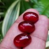 Color : Red Stone : Carnelian Weight : 6.10 Cts / 6.45 Cts / 6.40 Cts Dimension : 14.0 x 10.0 x 6.0 mm Treatment : Unheated Shape : Oval Cut : Cabochon Carnelian is a brownish-red or Orangy Red mineral variety of the silica mineral chalcedony colored by impurities of iron oxide Carnelian is created when liquid magma from a volcanic explosion cools down and transforms into igneous rock. During this cooling down period, silica acid bubbles shift from being a gas/liquid into a solid compound. Carnelian hardness is 6-7 according to the Mohs Hardness scale with 2.59–2.61 specific gravity. It is found colors such as Brownish-red, Orangy-red, Deep-red. Carnelian can be found locations such as Austria, China, Canada, Bulgaria, Australia, Brazil, Egypt, France, Germany, USA, UK, Switzerland, Sri Lanka, Slovakia, Russia, South Africa, New Zealand, Namibia. Carnelian crystal is a warm, vibrant stone that boosts confidence and the power of true expression. Carnelian is stimulating metabolism and a good supply of blood to the organs and tissues and aids in menstrual and menopausal symptoms and may aid in vitro and artificial insemination. It benefits the absorption of vitamins, nutrients, and minerals in the small intestine, and improves blood viscosity and circulation. Carnelian stimulates the Sacral Chakra located below the naval and above the pubic bone at the front of the pelvis. It controls the flow of energy and is the center of gravity of the body. It is the center of the Life Force of the body and controls the flow of information from the body to the mind and from the mind to the body. Carnelian is the traditional zodiac stone for those born under the sign Virgo, between August 23 and September 22, at the end of summer and the beginning of harvest. Carnelian increases blood circulation, aids in male impotency, increases appetite, alleviates problems of the liver, bladder, kidneys, and spleen. It can help with PMS as well as anxiety associated with sexual anxieties.