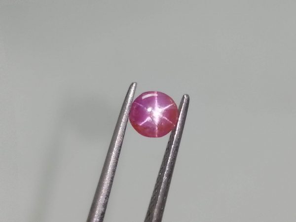 Natural Star Ruby Sri Lanka Colour : Pinkish-Red Shape : Oval Weight : 0.85 Cts Dimension : 5.1 x 5.3 x 3.1 mm Treatment : Uneated Clarity : i Origin : Sri Lanka   Sapphire is a precious gemstone, a variety of the mineral corundum, consisting of aluminum oxide with trace amounts of elements such as iron, titanium, chromium, copper, or magnesium. Sapphire deposits are found in Eastern Australia, Thailand, Sri Lanka, China, Vietnam, Madagascar, Greenland, East Africa, and in North America in mostly in Montana. Madagascar, Sri Lanka, and Kashmir produce large quantities of fine quality Sapphires for the world market. Sapphires are mined from alluvial deposits or from primary underground workings. Blue Sapphire and Ruby are the most popular Gemstone in Corundum Family. also, Orangy Pink Sapphire is called Padparadscha. The name Drive's from the Sinhalese word "padmaraga" " පද්මරාග", meaning lotus blossom, as the stone is of a similar color to the lotus blossom. Bi-Color Sapphire from DanuGroup Collection Also, Sapphire can be found as parti-color, bi-color or fancy color. Australia is a main parti-color Sapphire producer. White Sapphire also, White sapphire is a very popular stone to wear instead of Diamond as a 3rd hardness gemstone after diamond ( moissanite hardness is 9.5). Various colors of star sapphires A star sapphire is a type of sapphire that exhibits a star-like phenomenon known as asterism. Also, A rare variety of natural sapphire, known as color-change sapphire, exhibits different colors in a different light. Sapphires can be treated by several methods to enhance and improve their clarity and color. A common method is done by heating the sapphires in furnaces to temperatures between 500 and 1,850 °C for several hours, or by heating in a nitrogen-deficient atmosphere oven for 1 week or more. Geuda is a form of the mineral corundum. Geuda is found primarily in Sri Lanka. It's a semitransparent and milky appearance due to rutile inclusions. Geuda is used to improve its color by heat treatment. Some geuda varieties turn to a blue color after heat treatments and some turn to red after oxidizing. Also, Kowangu pushparaga turns to yellow sapphire after oxidizing. Sapphire Crystal system is a Trigonal crystal system with a hexagonal scalenohedral crystal class. Sapphire hardness is 9 according to the Mohs hardness scale with 4.0~4.1 specific gravity. Refractive index ω          =1.768–1.772 nε =1.760–1.763 Solubility = Insoluble Melting point = 2,030–2,050 °C Birefringence  = 0.008 Pleochroism = Strong Luster = Vitreous Sapphire is the birthstone for September and the gem of the 45th anniversary. Healing Properties of Sapphire Sapphire releases mental tension, depression, unwanted thoughts, and spiritual confusion.  Sapphire is known as a "stone of Wisdom". It is exceptional for calming and focusing the mind, allowing the release of mental tension and unwanted thoughts. Sapphire is also the best stone for awakening chakras. Dark Blue or Indigo Sapphire stimulates the Third Eye chakra. Blue Sapphire stimulates the Throat Chakra. Green sapphire stimulates Heart Chakra. Black Sapphire stimulates Base Chakra. White sapphire stimulates Crown Chakra. Yellow sapphire stimulates Solar Plexus Chakra. Star Ruby gemstones are effective psychic protection stones and are excellent assets to help you to defend yourself against psychic attacks from negative entities. It has strong vibration will encourage an increase in your sensuality, sexuality, and passion for life.