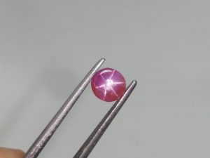 Natural Star Ruby Sri Lanka  Colour : Pinkish-Red  Shape : Oval  Weight : 0.85 Cts  Dimension : 5.1 x 5.3 x 3.1 mm  Treatment : Uneated  Clarity : i  Origin : Sri Lanka       Sapphire is a precious gemstone, a variety of the mineral corundum, consisting of aluminum oxide with trace amounts of elements such as iron, titanium, chromium, copper, or magnesium.  Sapphire deposits are found in Eastern Australia, Thailand, Sri Lanka, China, Vietnam, Madagascar, Greenland, East Africa, and in North America in mostly in Montana. Madagascar, Sri Lanka, and Kashmir produce large quantities of fine quality Sapphires for the world market. Sapphires are mined from alluvial deposits or from primary underground workings.        Blue Sapphire and Ruby are the most popular Gemstone in Corundum Family.  also, Orangy Pink Sapphire is called Padparadscha. The name Drive's from the Sinhalese word "padmaraga" " පද්මරාග", meaning lotus blossom, as the stone is of a similar color to the lotus blossom.  Bi-Color Sapphire from DanuGroup Collection  Also, Sapphire can be found as parti-color, bi-color or fancy color. Australia is a main parti-color Sapphire producer.  White Sapphire  also, White sapphire is a very popular stone to wear instead of Diamond as a 3rd hardness gemstone after diamond ( moissanite hardness is 9.5).  Various colors of star sapphires  A star sapphire is a type of sapphire that exhibits a star-like phenomenon known as asterism.  Also, A rare variety of natural sapphire, known as color-change sapphire, exhibits different colors in a different light.  Sapphires can be treated by several methods to enhance and improve their clarity and color. A common method is done by heating the sapphires in furnaces to temperatures between 500 and 1,850 °C for several hours, or by heating in a nitrogen-deficient atmosphere oven for 1 week or more. Geuda is a form of the mineral corundum. Geuda is found primarily in Sri Lanka. It's a semitransparent and milky appearance due to rutile inclusions. Geuda is used to improve its color by heat treatment. Some geuda varieties turn to a blue color after heat treatments and some turn to red after oxidizing. Also, Kowangu pushparaga turns to yellow sapphire after oxidizing.  Sapphire Crystal system is a Trigonal crystal system with a hexagonal scalenohedral crystal class. Sapphire hardness is 9 according to the Mohs hardness scale with 4.0~4.1 specific gravity.     Refractive index ω          =1.768–1.772 nε =1.760–1.763 Solubility = Insoluble  Melting point = 2,030–2,050 °C  Birefringence  = 0.008  Pleochroism = Strong  Luster = Vitreous  Sapphire is the birthstone for September and the gem of the 45th anniversary.  Healing Properties of Sapphire  Sapphire releases mental tension, depression, unwanted thoughts, and spiritual confusion.  Sapphire is known as a "stone of Wisdom". It is exceptional for calming and focusing the mind, allowing the release of mental tension and unwanted thoughts. Sapphire is also the best stone for awakening chakras. Dark Blue or Indigo Sapphire stimulates the Third Eye chakra. Blue Sapphire stimulates the Throat Chakra. Green sapphire stimulates Heart Chakra. Black Sapphire stimulates Base Chakra. White sapphire stimulates Crown Chakra. Yellow sapphire stimulates Solar Plexus Chakra.  Star Ruby gemstones are effective psychic protection stones and are excellent assets to help you to defend yourself against psychic attacks from negative entities. It has strong vibration will encourage an increase in your sensuality, sexuality, and passion for life.