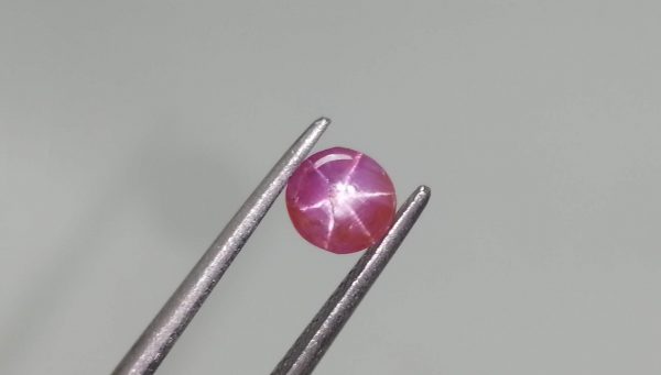 Natural Star Ruby Sri Lanka Colour : Pinkish-Red Shape : Oval Weight : 0.85 Cts Dimension : 5.1 x 5.3 x 3.1 mm Treatment : Uneated Clarity : i Origin : Sri Lanka Sapphire is a precious gemstone, a variety of the mineral corundum, consisting of aluminum oxide with trace amounts of elements such as iron, titanium, chromium, copper, or magnesium. Sapphire deposits are found in Eastern Australia, Thailand, Sri Lanka, China, Vietnam, Madagascar, Greenland, East Africa, and in North America in mostly in Montana. Madagascar, Sri Lanka, and Kashmir produce large quantities of fine quality Sapphires for the world market. Sapphires are mined from alluvial deposits or from primary underground workings. Blue Sapphire and Ruby are the most popular Gemstone in Corundum Family. also, Orangy Pink Sapphire is called Padparadscha. The name Drive's from the Sinhalese word "padmaraga" " පද්මරාග", meaning lotus blossom, as the stone is of a similar color to the lotus blossom. Bi-Color Sapphire from DanuGroup Collection Also, Sapphire can be found as parti-color, bi-color or fancy color. Australia is a main parti-color Sapphire producer. White Sapphire also, White sapphire is a very popular stone to wear instead of Diamond as a 3rd hardness gemstone after diamond ( moissanite hardness is 9.5). Various colors of star sapphires A star sapphire is a type of sapphire that exhibits a star-like phenomenon known as asterism. Also, A rare variety of natural sapphire, known as color-change sapphire, exhibits different colors in a different light. Sapphires can be treated by several methods to enhance and improve their clarity and color. A common method is done by heating the sapphires in furnaces to temperatures between 500 and 1,850 °C for several hours, or by heating in a nitrogen-deficient atmosphere oven for 1 week or more. Geuda is a form of the mineral corundum. Geuda is found primarily in Sri Lanka. It's a semitransparent and milky appearance due to rutile inclusions. Geuda is used to improve its color by heat treatment. Some geuda varieties turn to a blue color after heat treatments and some turn to red after oxidizing. Also, Kowangu pushparaga turns to yellow sapphire after oxidizing. Sapphire Crystal system is a Trigonal crystal system with a hexagonal scalenohedral crystal class. Sapphire hardness is 9 according to the Mohs hardness scale with 4.0~4.1 specific gravity. Refractive index ω =1.768–1.772 nε =1.760–1.763 Solubility = Insoluble Melting point = 2,030–2,050 °C Birefringence = 0.008 Pleochroism = Strong Luster = Vitreous Sapphire is the birthstone for September and the gem of the 45th anniversary. Healing Properties of Sapphire Sapphire releases mental tension, depression, unwanted thoughts, and spiritual confusion. Sapphire is known as a "stone of Wisdom". It is exceptional for calming and focusing the mind, allowing the release of mental tension and unwanted thoughts. Sapphire is also the best stone for awakening chakras. Dark Blue or Indigo Sapphire stimulates the Third Eye chakra. Blue Sapphire stimulates the Throat Chakra. Green sapphire stimulates Heart Chakra. Black Sapphire stimulates Base Chakra. White sapphire stimulates Crown Chakra. Yellow sapphire stimulates Solar Plexus Chakra. Star Ruby gemstones are effective psychic protection stones and are excellent assets to help you to defend yourself against psychic attacks from negative entities. It has strong vibration will encourage an increase in your sensuality, sexuality, and passion for life.