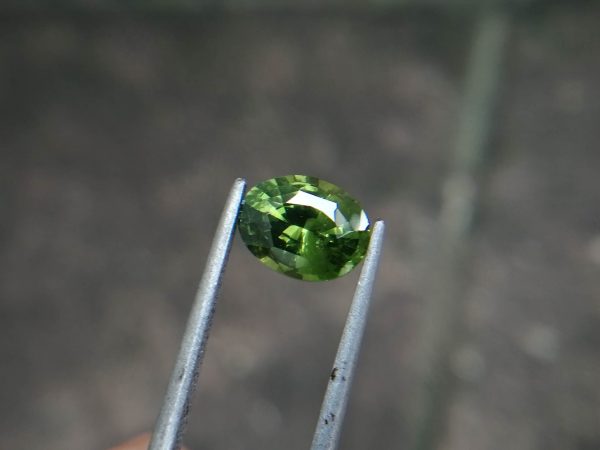 Natural Green Zircon Sri Lanka - Beccarite Zircon Colour: Green Shape: Oval Weight : 1.85 Cts Dimension : 8.1 x 6.1 x 4.5 mm Treatment: Unheated Clarity : SI Origin : Sri Lanka Zircon is a nesosilicates group mineral. Its corresponding chemical formula is ZrSiO4. The name derives from the Persian zargun, meaning "gold-hued". Zircon is a popular gemstone that has been used for nearly 2000 years. The crystal structure of zircon is a tetragonal crystal mineral with 7.5 hardness according to the Mohs Hardness scale. Zircon is also very resistant to heat and corrosion and known as Insoluble gemstone. This Uniaxial (+) mineral Specific gravity is 4.6–4.7. It's heavy more than such as Sapphire, chrysoberyl, Garnets, spinels. Gem Businessmen use these physical properties to identify zircons from other gemstones. Zircon has weak pleochroism and has colors such as Colorless, Very Strong Blue To Green-Blue, Yellow, Blue-Green, Yellowish Green, Yellow-Green, Brown, Orangy Yellow To Reddish Orange, Dark Brownish Red, Sometimes Purple, Gray To Bluish Gray, Brownish Gray. Colorless specimens that show gem quality are a popular substitute for diamond and are also known as "Matara diamond". Zircon has been classified into three types called high zircon, intermediate zircon ( medium zircon ), and low zircon. Some Quality Type brown zircons can be transformed into colorless and blue zircons by heating to 800 to 1000 °C. There are Some using names for Zircon such as Hyacinth or jacinth: yellow-red, orange, red-brown to brown, Jargoon or jargon: light yellow to colorless stones, Beccarite: green zircon, Melichrysos: straw yellow, Starlite: blue heat treated zircon, Sparklite: colorless zircon. Zircon is found in Madagascar, Sri Lanka, Tanzania, Cambodia, Australia, Burma, Afghanistan, Canada, USA, Thailand, Russia, Mozambique, Norway. Healing Properties 👇 Zircon is known as "The stone of virtue" All colors. It clears the auric negativity in the wearer and helps to communicate with the higher realm when in need. Zircon is very well known for its balancing and positive energy effects. It can attract happiness, prosperity, and abundance to the wearer. It will bring the spiritual energy down from the higher transpersonal chakras via the crown chakra, then move it to all of the lower chakras. Green zircon stimulates the Heart chakra. Also. It is a good crystal for meditation to open heart chakra energies. Its vibrational energies help to user stay on the spiritual path.