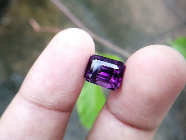 Colour :  Purple Shape : Octagon Weight :  5.35  Cts Dimension : 11.1 x 8.5 x 8.1 mm Treatment : Unheated Clarity : VS Natural Amethyst  Amethyst is a violet variety of quartz. It's a birth stone of month February.  The name comes from the Koine Greek ἀμέθυστος amethystos from ἀ- a-, "not" and μεθύσκω methysko / μεθύω methyo, "intoxicate", a reference to the belief that the stone protected its owner from drunkenness. Category: Silicate mineral Formula: SiO2 Crystal system: Trigonal Color: Purple, violet Mohs scale hardness: 7 Specific gravity: 2.65 Av Optical properties: Uniaxial (+) Refractive index: nω = 1.543–1.553                                 nε = 1.552–1.554 Amethyst can be found in Sri Lanka, Madagascar, Zambia, Zimbabwe, USA, Brazil, Uruguay, Thailand, Turkey, Tanzania, Tajikistan, Switzerland, Sweden, Spain, South Korea, Africa, Russia, Afghanistan, New Zealand, Norway, Nigeria, Namibia, Myanmar, Mozambique, Morocco, Mongolia, Mexico, Kenya, Laos, Japan, Germany, France, Finland, China, Canada, Bulgaria, Cambodia, Australia, Belgium.  Amethyst has healing powers to help with physical ailments, emotional issues, and in Energy Healing and Chakra balancing      Amethyst boosts the production of hormones, and stimulates the sympathetic nervous system and endocrine glands to optimum performance. It supports oxygenation in the blood, and aids in treatments of the digestive tract, heart, stomach, and skin.        The therapeutic uses of Amethyst have a long and well-documented history. Amethyst crystal therapies are primarily associated with physical ailments of the nervous system, the curing of nightmares and insomnia, and balancing the crown chakra. It's also excellent crystal for meditation to open Crown Chakra energies. 