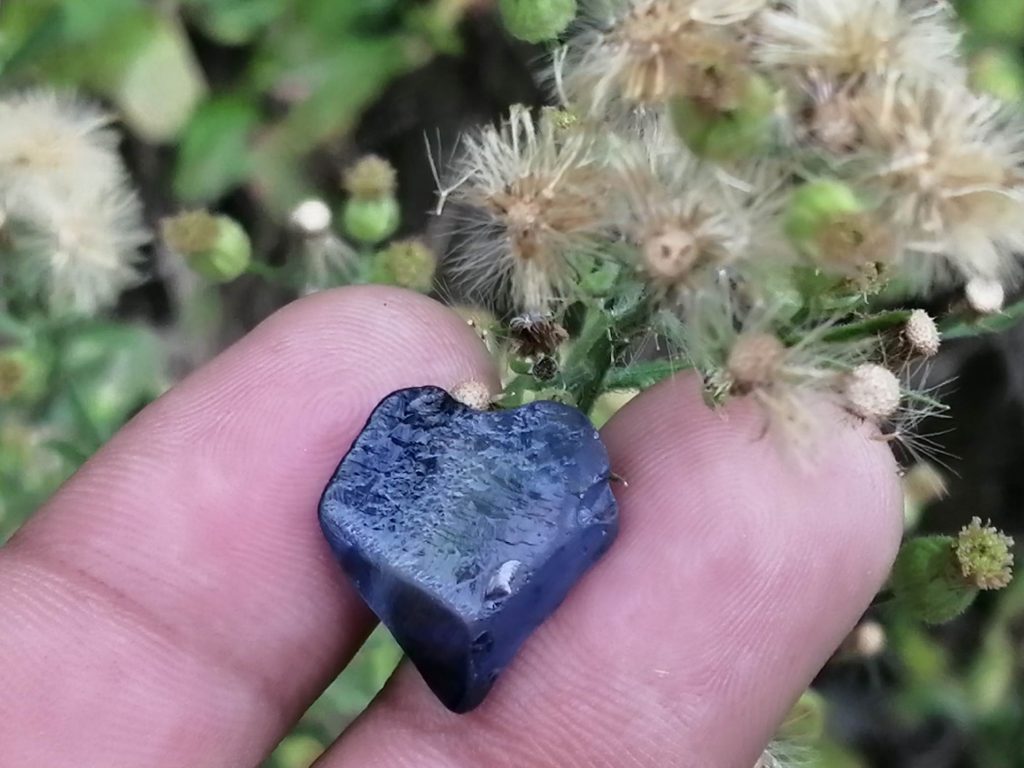Blue Sapphire is a color variety of mineral corundum. The intense blue of the sapphire is caused by the addition of titanium and iron to the mineral corundum. Blue Sapphire color can be described in terms of hue, saturation, and tone. It is evaluated based upon the purity of their blue hue.