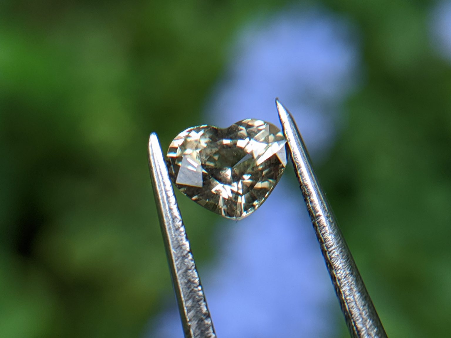 13_Natural green sapphire heart danu group Gemstones_compress24