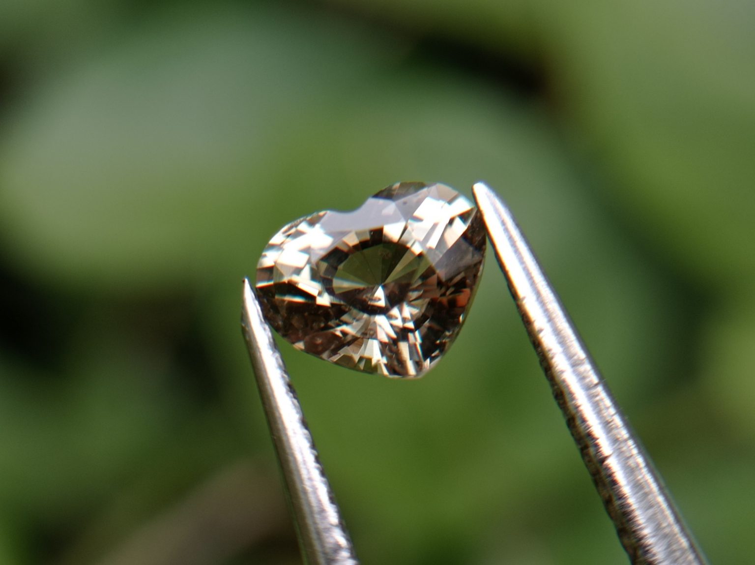 15_Natural green sapphire heart danu group Gemstones_compress50