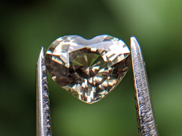 6_Natural green sapphire heart danu group Gemstones_compress47