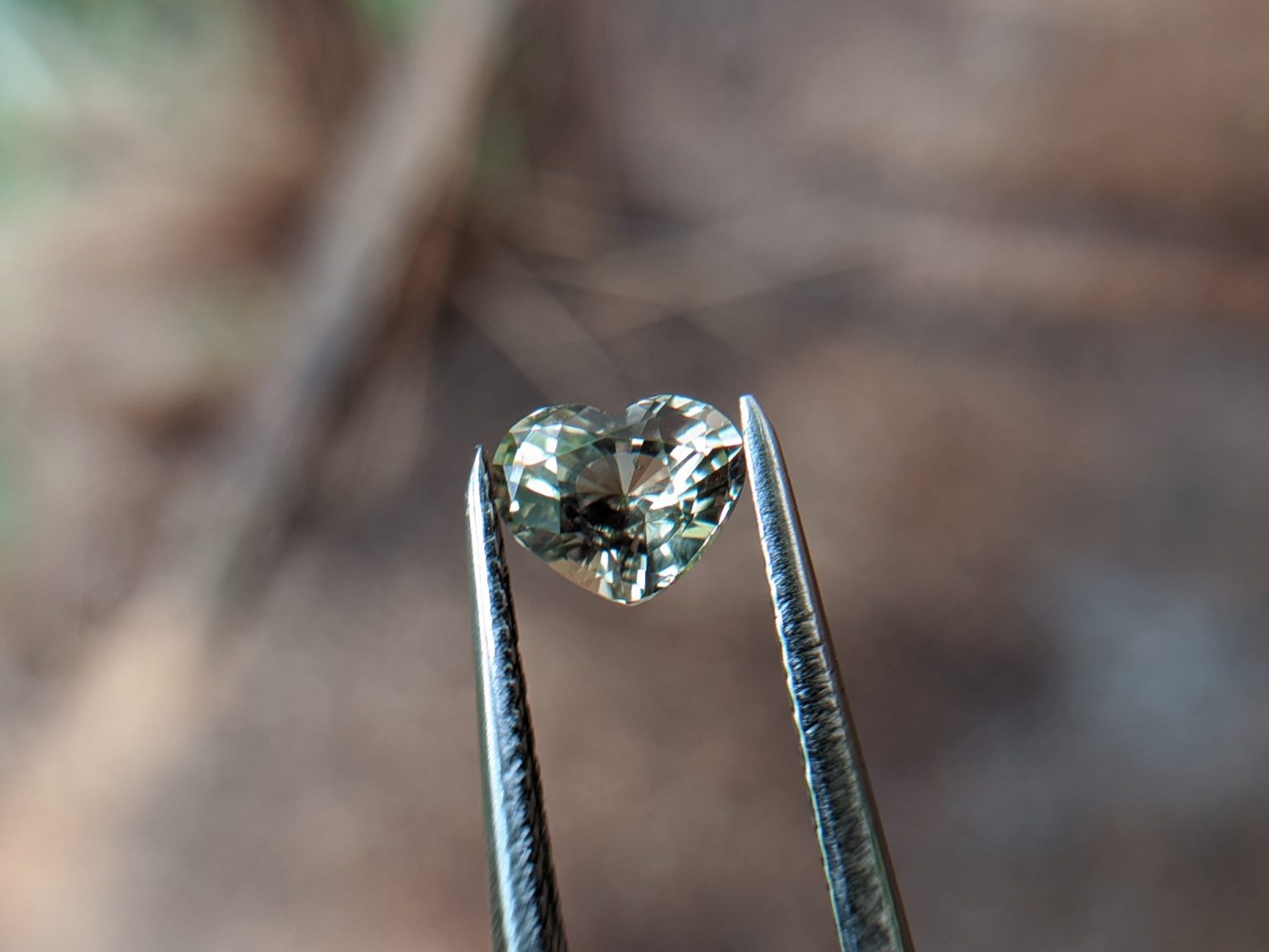 8_Natural green sapphire heart danu group Gemstones_compress29