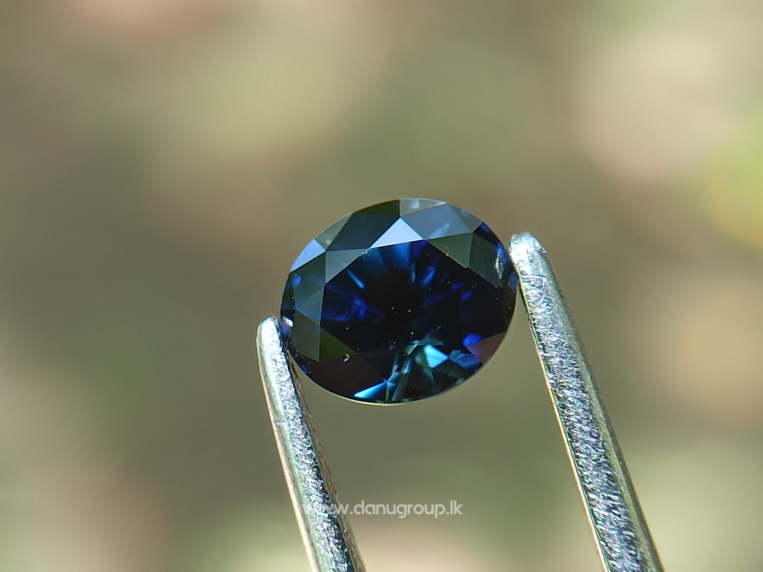 Ceylon Peacock Blue Sapphire Oval shape gem from Danu Group Gemstones -- danugroup.lk