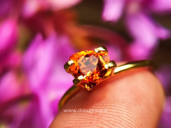 Natural Vivid Orange Spessartite Garnet Triangular Shape stone from Danu Group Gemstones Collection - danugroup.lk