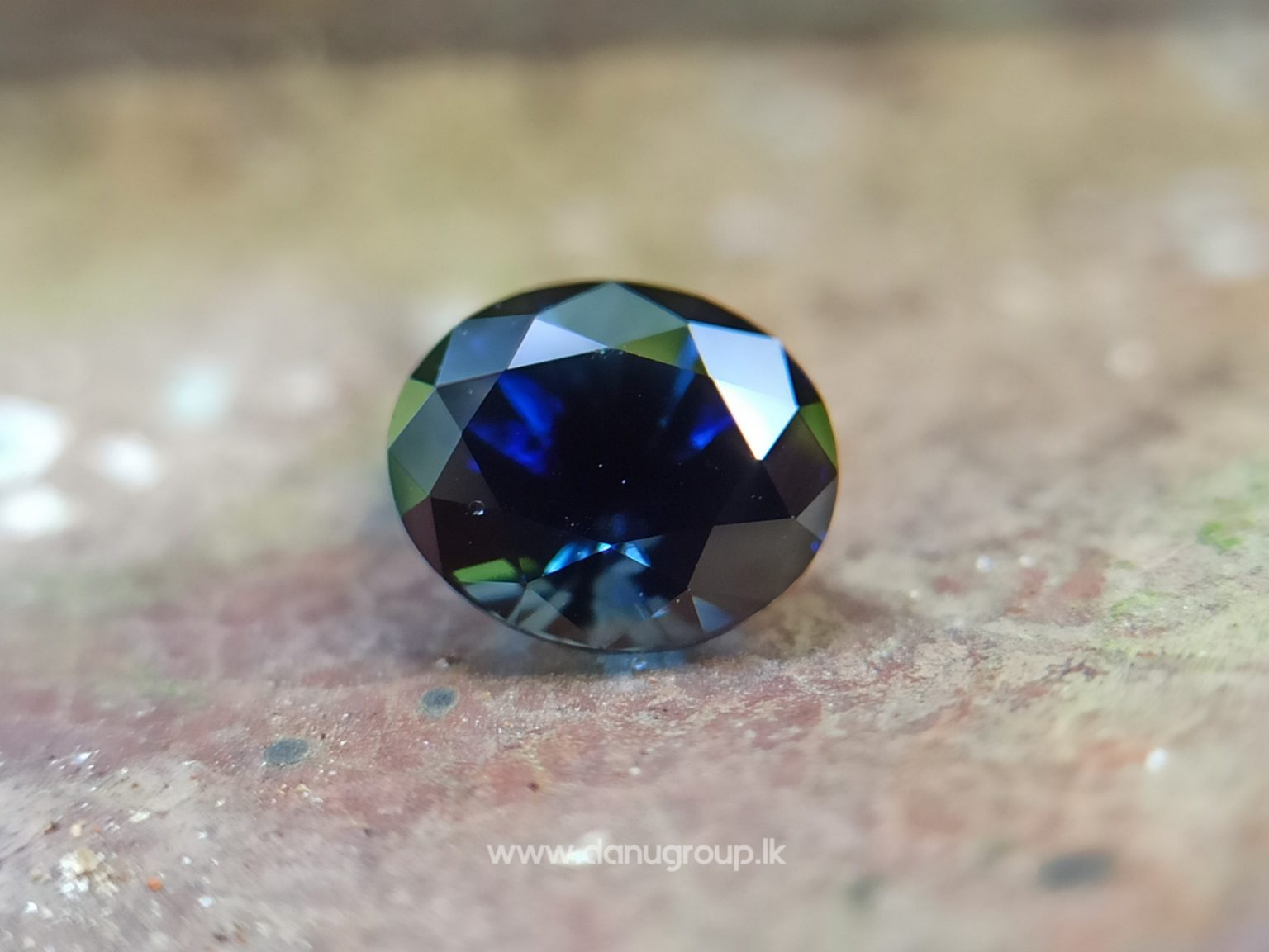 Ceylon Peacock Blue Sapphire Oval shape gem from Danu Group Gemstones -- danugroup.lk