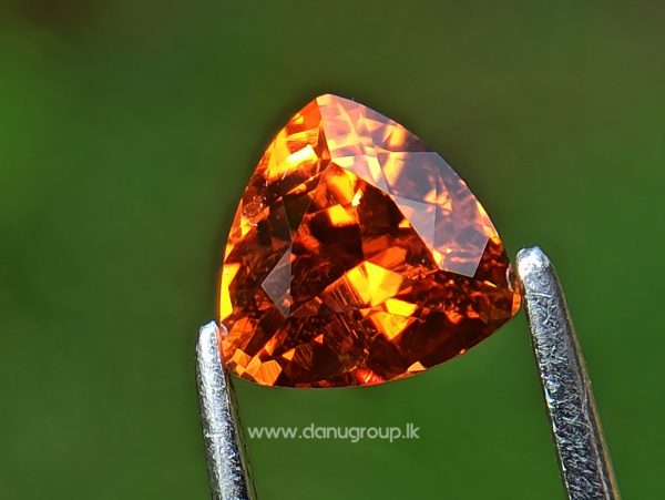 Natural Vivid Orange Spessartite Garnet Triangular Shape stone from Danu Group Gemstones Collection - danugroup.lk