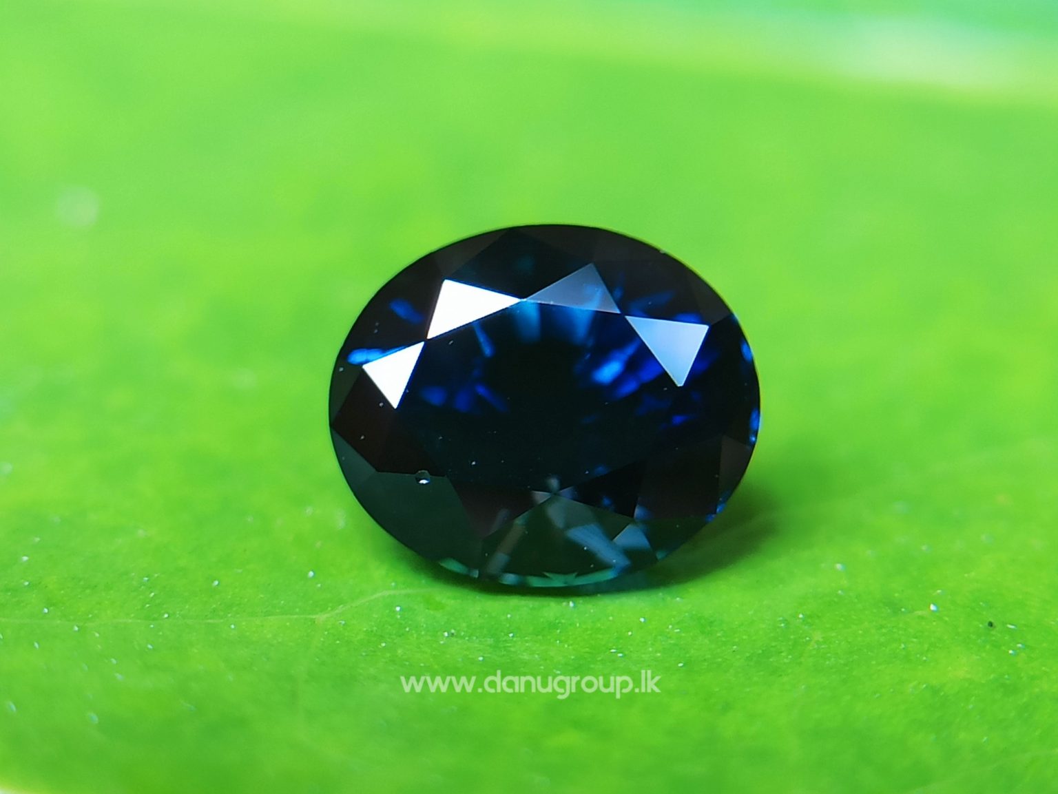 Ceylon Peacock Blue Sapphire Oval shape gem from Danu Group Gemstones -- danugroup.lk