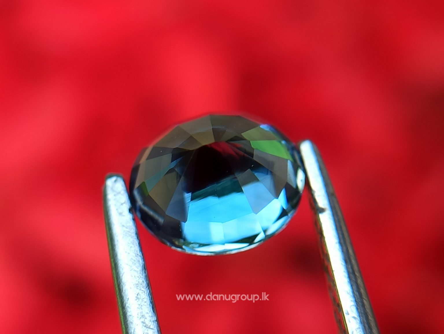 Ceylon Peacock Blue Sapphire Oval shape gem from Danu Group Gemstones -- danugroup.lk