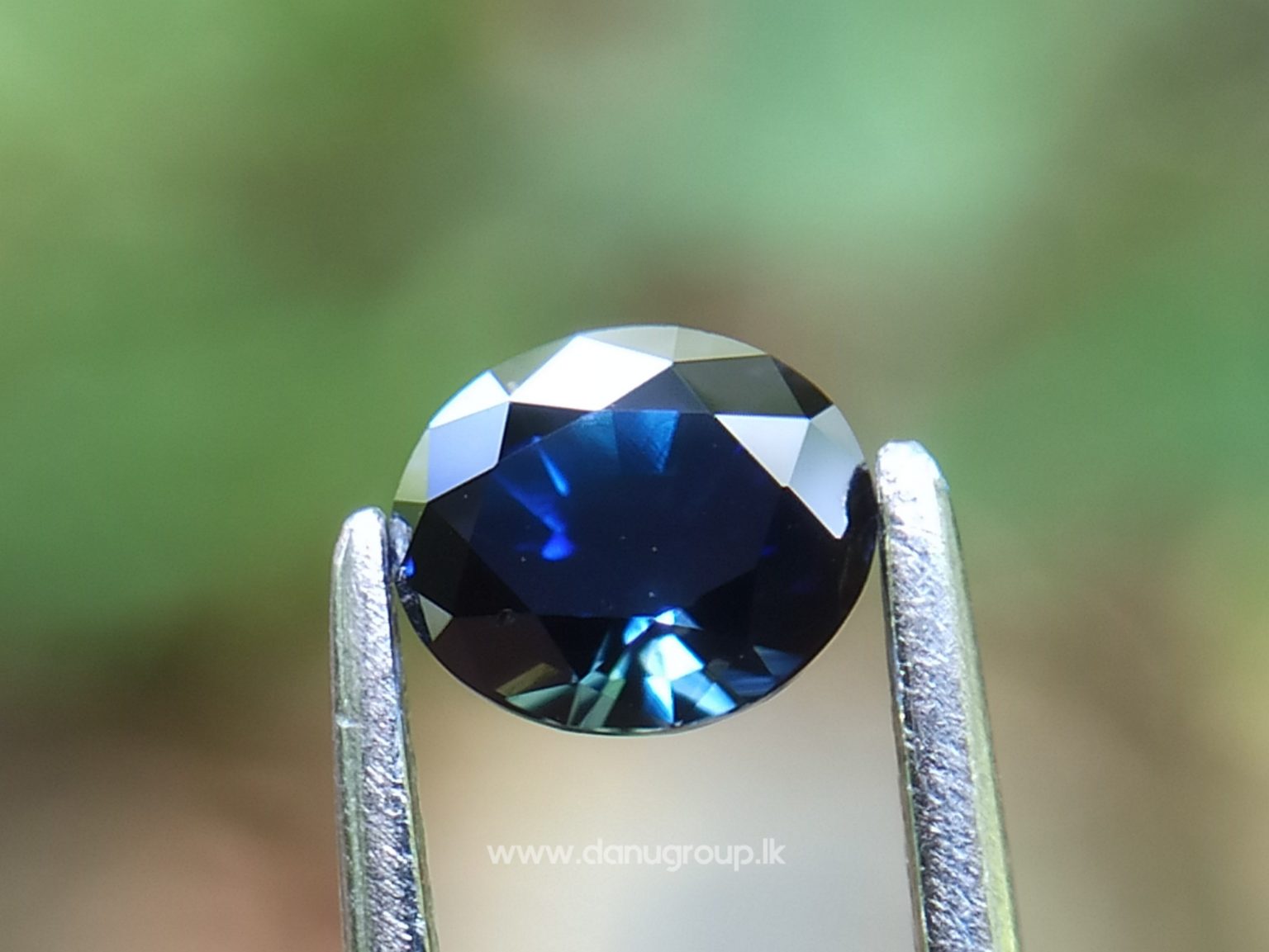 Ceylon Peacock Blue Sapphire Oval shape gem from Danu Group Gemstones -- danugroup.lk