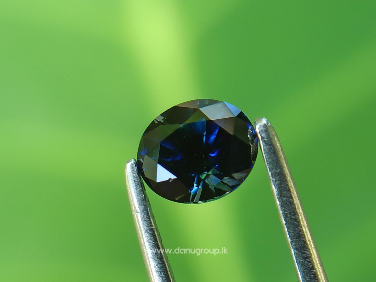 Ceylon Peacock Blue Sapphire Oval shape gem from Danu Group Gemstones -- danugroup.lk