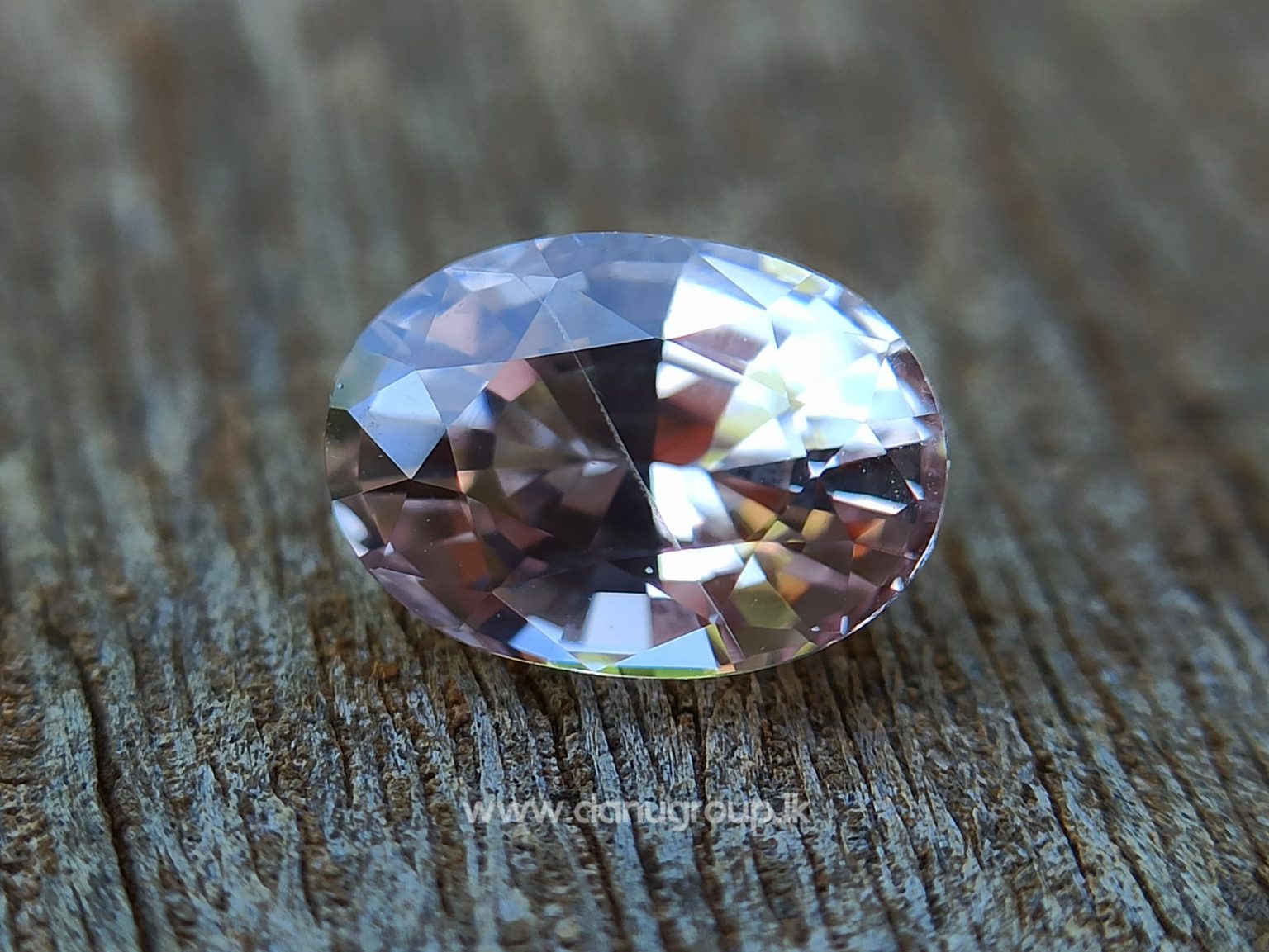 Ceylon Natural Light Peachy Pink Sapphire Danu Group collection