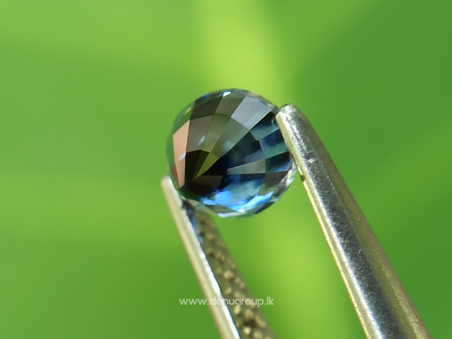 Ceylon Peacock Blue Sapphire Oval shape gem from Danu Group Gemstones -- danugroup.lk