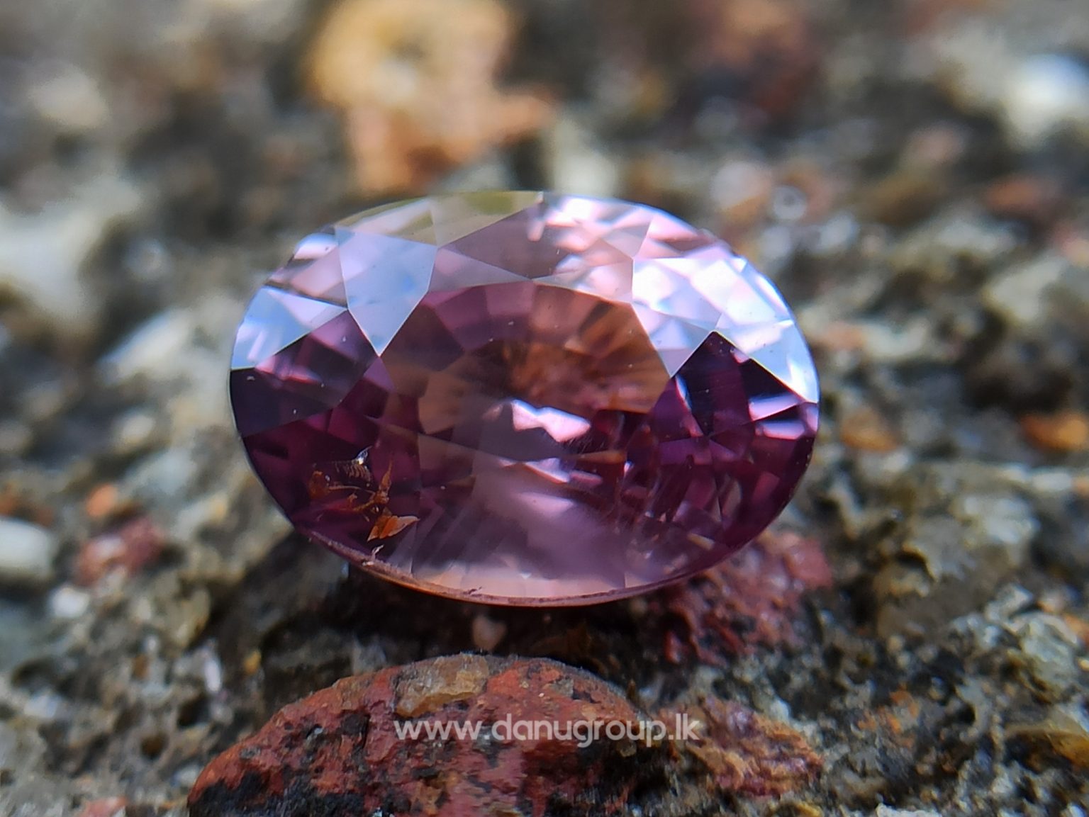 Natural Brownish Purple Sapphire Oval shape gem from Danu Group - danugroup.lk