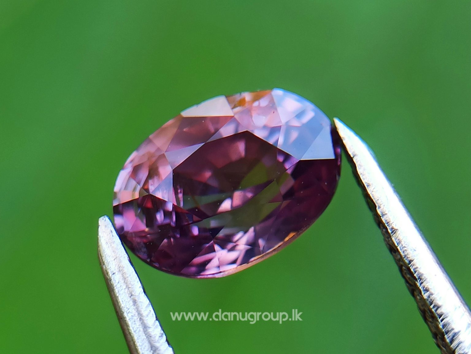 Natural Brownish Purple Sapphire Oval shape gem from Danu Group - danugroup.lk