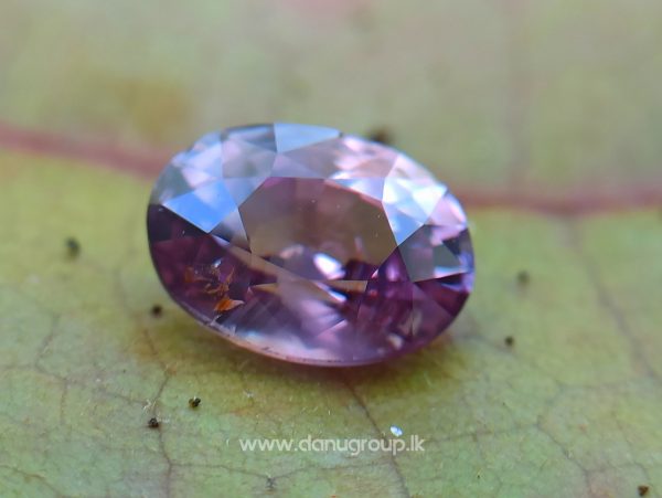 Natural Brownish Purple Sapphire Oval shape gem from Danu Group - danugroup.lk