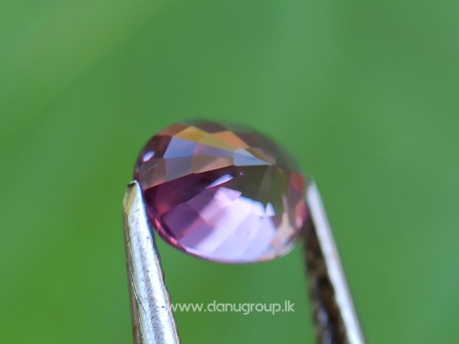 Natural Brownish Purple Sapphire Oval shape gem from Danu Group - danugroup.lk